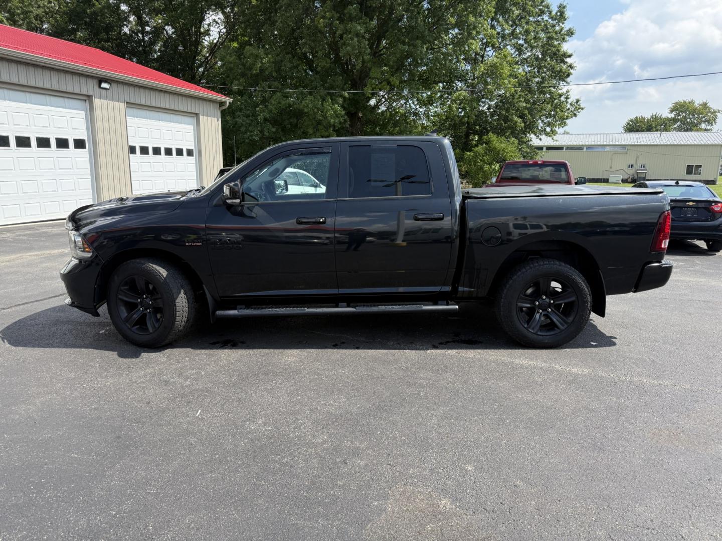 2017 Black /Black RAM 1500 Sport Crew Cab SWB 4WD (1C6RR7MT9HS) with an 5.7L V8 OHV 16V engine, Automatic transmission, located at 547 E. Main St., Orwell, OH, 44076, (440) 437-5893, 41.535435, -80.847855 - Towing Capability If you want a full-size truck that looks sharp and is ready to work, this 2017 Ram 1500 Sport Crew Cab 4WD is a strong option. The 5.7L HEMI V8 and 8-speed automatic deliver dependable power, while 3.92 gearing and on-demand 4WD support a capable 10,140 lb towing capacity. It also- Photo#34