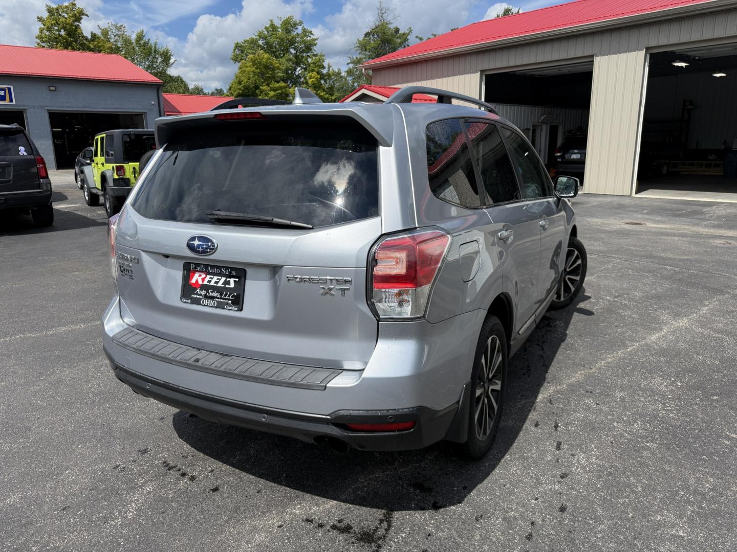 2017 Silver /Black Subaru Forester 2.0XT Touring (JF2SJGWC9HH) with an 2.0L H4 DOHC 16V Turbo engine, Automatic transmission, located at 547 E. Main St., Orwell, OH, 44076, (440) 437-5893, 41.535435, -80.847855 - 2017 Subaru Forester XT Touring – Turbo Power with Premium Comfort and All-Weather Confidence If you want a compact SUV that feels quicker than the typical Forester and still ready for changing conditions, this 2017 Subaru Forester XT Touring is a strong choice. The 2.0L turbocharged engine deliv- Photo#30