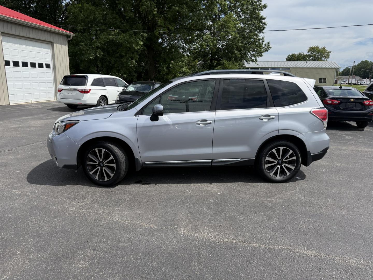 2017 Silver /Black Subaru Forester 2.0XT Touring (JF2SJGWC9HH) with an 2.0L H4 DOHC 16V Turbo engine, Automatic transmission, located at 547 E. Main St., Orwell, OH, 44076, (440) 437-5893, 41.535435, -80.847855 - 2017 Subaru Forester XT Touring – Turbo Power with Premium Comfort and All-Weather Confidence If you want a compact SUV that feels quicker than the typical Forester and still ready for changing conditions, this 2017 Subaru Forester XT Touring is a strong choice. The 2.0L turbocharged engine deliv- Photo#35