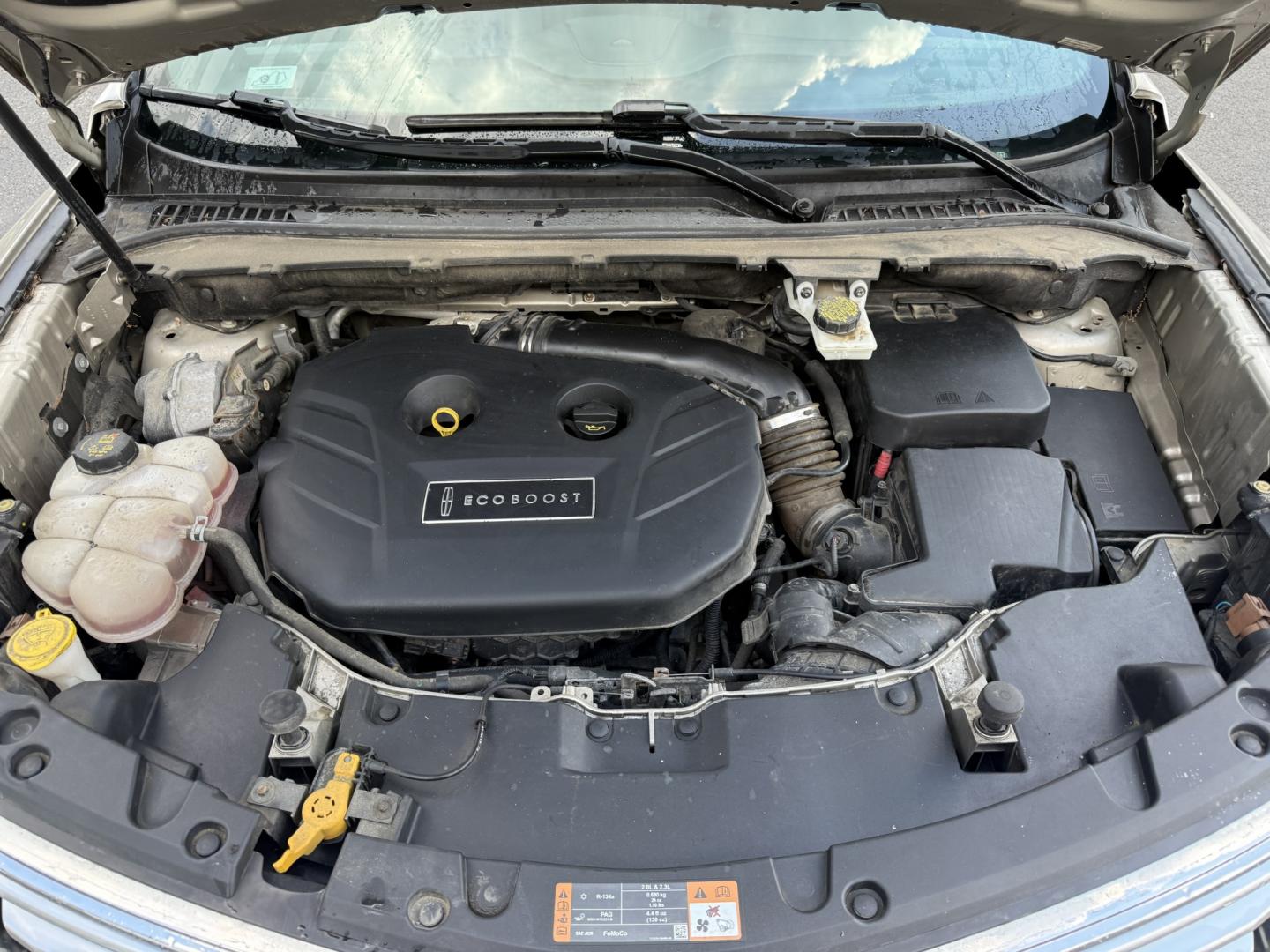 2015 Tan /Black Lincoln MKC Reserve AWD (5LMTJ2AHXFU) with an 2.3L I4 DOHC 16V Turbo engine, Automatic transmission, located at 547 E. Main St., Orwell, OH, 44076, (440) 437-5893, 41.535435, -80.847855 - 2015 Lincoln MKC Reserve AWD – Compact Luxury with Comfort and Everyday Convenience If you want a smaller luxury SUV that still feels well appointed, this 2015 Lincoln MKC Reserve AWD is a strong option. The 2.3L EcoBoost engine and 6-speed automatic deliver responsive power with available AWD fo- Photo#6