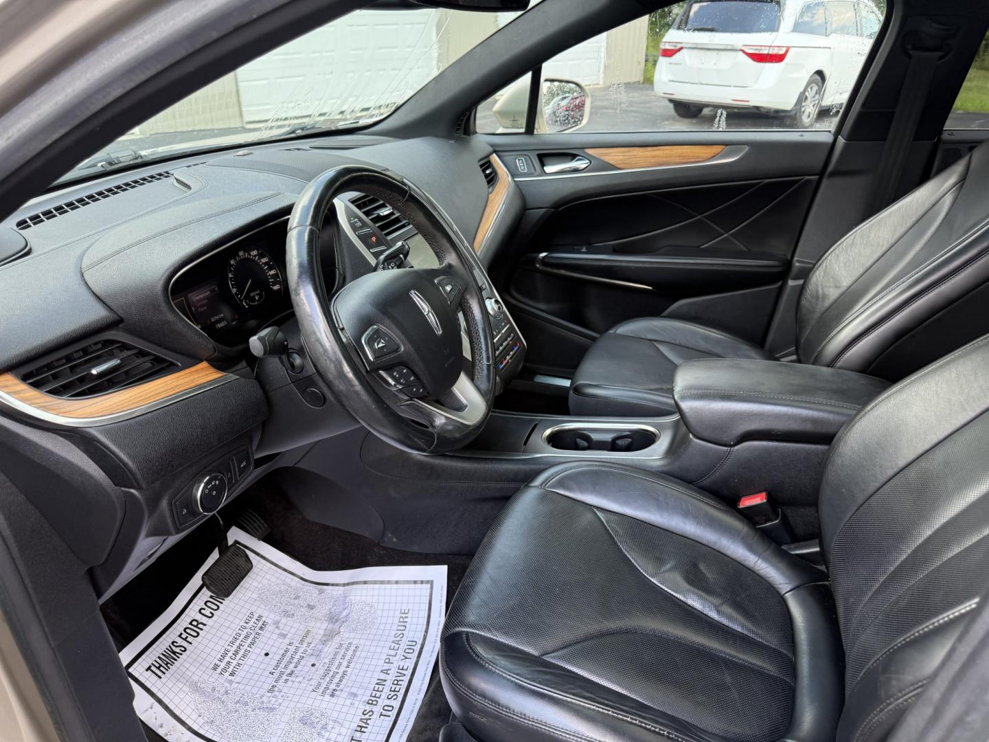 2015 Tan /Black Lincoln MKC Reserve AWD (5LMTJ2AHXFU) with an 2.3L I4 DOHC 16V Turbo engine, Automatic transmission, located at 547 E. Main St., Orwell, OH, 44076, (440) 437-5893, 41.535435, -80.847855 - 2015 Lincoln MKC Reserve AWD – Compact Luxury with Comfort and Everyday Convenience If you want a smaller luxury SUV that still feels well appointed, this 2015 Lincoln MKC Reserve AWD is a strong option. The 2.3L EcoBoost engine and 6-speed automatic deliver responsive power with available AWD fo- Photo#7