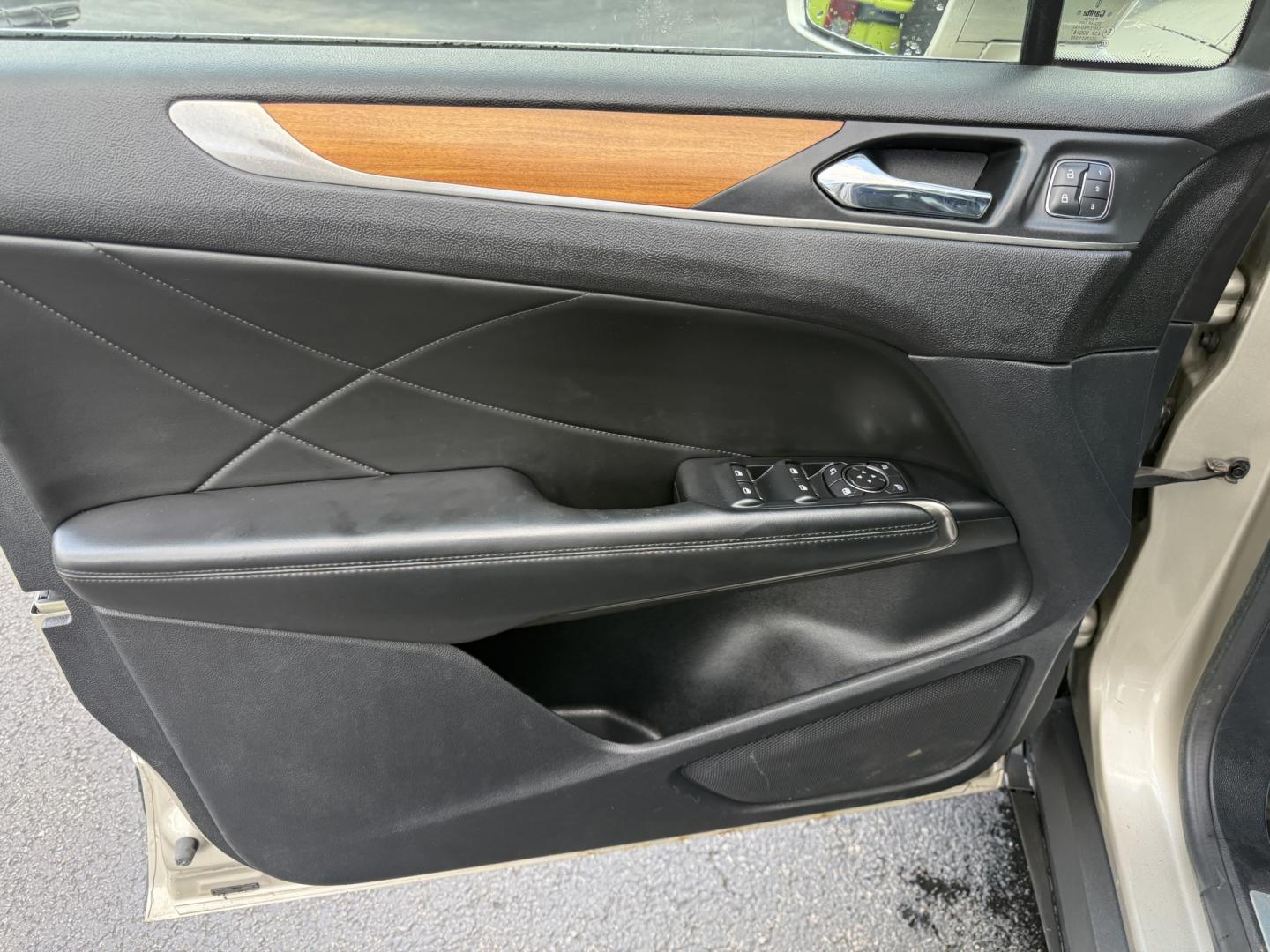 2015 Tan /Black Lincoln MKC Reserve AWD (5LMTJ2AHXFU) with an 2.3L I4 DOHC 16V Turbo engine, Automatic transmission, located at 547 E. Main St., Orwell, OH, 44076, (440) 437-5893, 41.535435, -80.847855 - 2015 Lincoln MKC Reserve AWD – Compact Luxury with Comfort and Everyday Convenience If you want a smaller luxury SUV that still feels well appointed, this 2015 Lincoln MKC Reserve AWD is a strong option. The 2.3L EcoBoost engine and 6-speed automatic deliver responsive power with available AWD fo- Photo#8