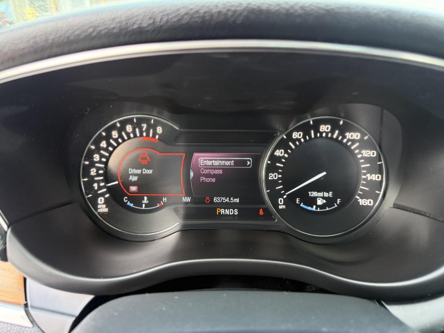 2015 Tan /Black Lincoln MKC Reserve AWD (5LMTJ2AHXFU) with an 2.3L I4 DOHC 16V Turbo engine, Automatic transmission, located at 547 E. Main St., Orwell, OH, 44076, (440) 437-5893, 41.535435, -80.847855 - 2015 Lincoln MKC Reserve AWD – Compact Luxury with Comfort and Everyday Convenience If you want a smaller luxury SUV that still feels well appointed, this 2015 Lincoln MKC Reserve AWD is a strong option. The 2.3L EcoBoost engine and 6-speed automatic deliver responsive power with available AWD fo- Photo#13