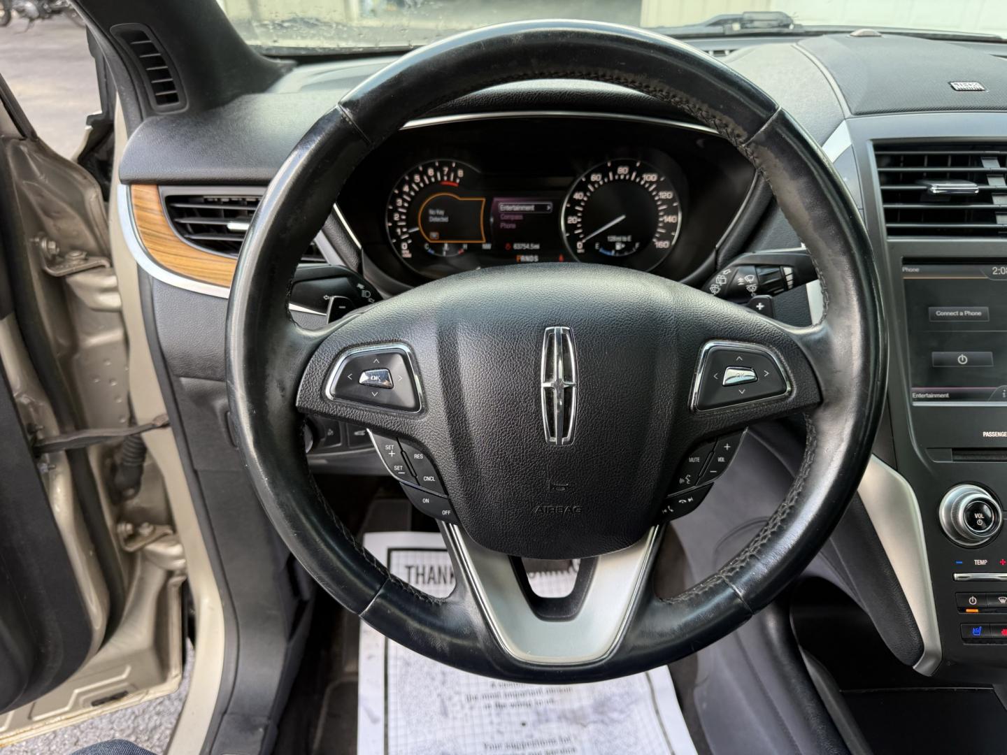 2015 Tan /Black Lincoln MKC Reserve AWD (5LMTJ2AHXFU) with an 2.3L I4 DOHC 16V Turbo engine, Automatic transmission, located at 547 E. Main St., Orwell, OH, 44076, (440) 437-5893, 41.535435, -80.847855 - 2015 Lincoln MKC Reserve AWD – Compact Luxury with Comfort and Everyday Convenience If you want a smaller luxury SUV that still feels well appointed, this 2015 Lincoln MKC Reserve AWD is a strong option. The 2.3L EcoBoost engine and 6-speed automatic deliver responsive power with available AWD fo- Photo#14