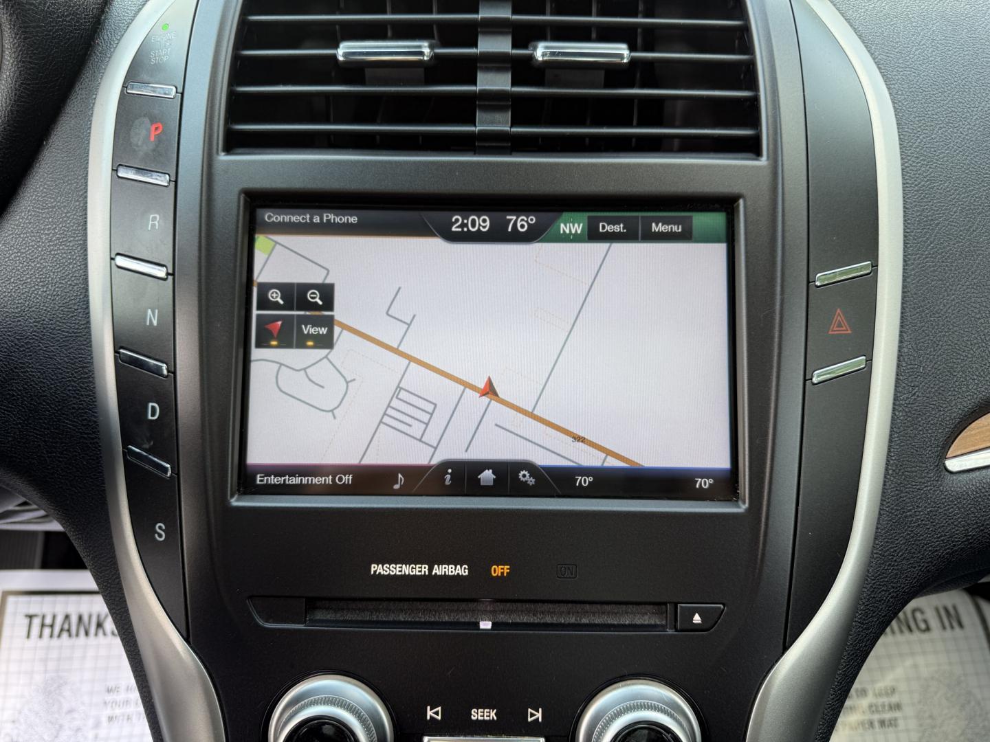 2015 Tan /Black Lincoln MKC Reserve AWD (5LMTJ2AHXFU) with an 2.3L I4 DOHC 16V Turbo engine, Automatic transmission, located at 547 E. Main St., Orwell, OH, 44076, (440) 437-5893, 41.535435, -80.847855 - 2015 Lincoln MKC Reserve AWD – Compact Luxury with Comfort and Everyday Convenience If you want a smaller luxury SUV that still feels well appointed, this 2015 Lincoln MKC Reserve AWD is a strong option. The 2.3L EcoBoost engine and 6-speed automatic deliver responsive power with available AWD fo- Photo#17
