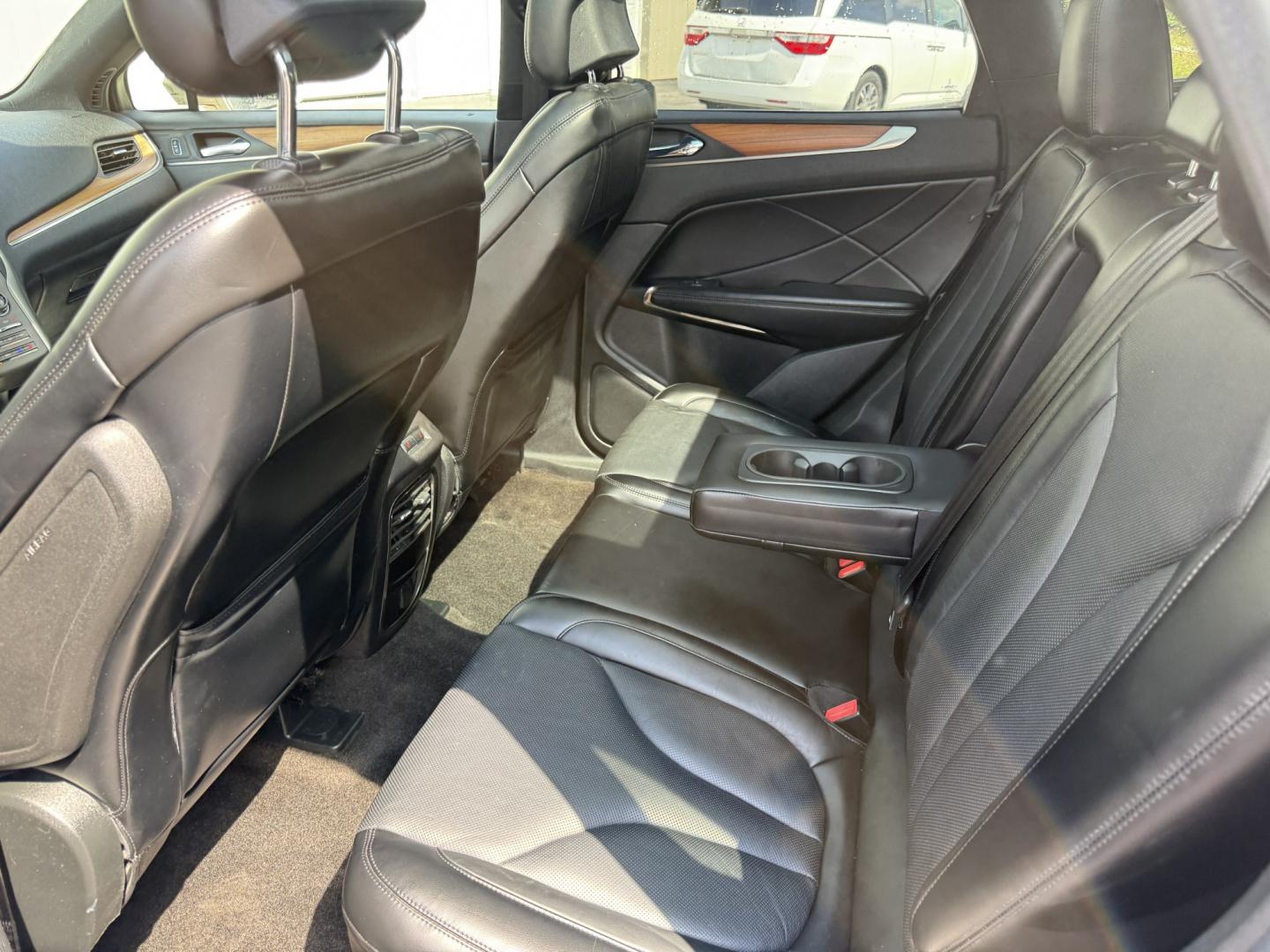 2015 Tan /Black Lincoln MKC Reserve AWD (5LMTJ2AHXFU) with an 2.3L I4 DOHC 16V Turbo engine, Automatic transmission, located at 547 E. Main St., Orwell, OH, 44076, (440) 437-5893, 41.535435, -80.847855 - 2015 Lincoln MKC Reserve AWD – Compact Luxury with Comfort and Everyday Convenience If you want a smaller luxury SUV that still feels well appointed, this 2015 Lincoln MKC Reserve AWD is a strong option. The 2.3L EcoBoost engine and 6-speed automatic deliver responsive power with available AWD fo- Photo#24
