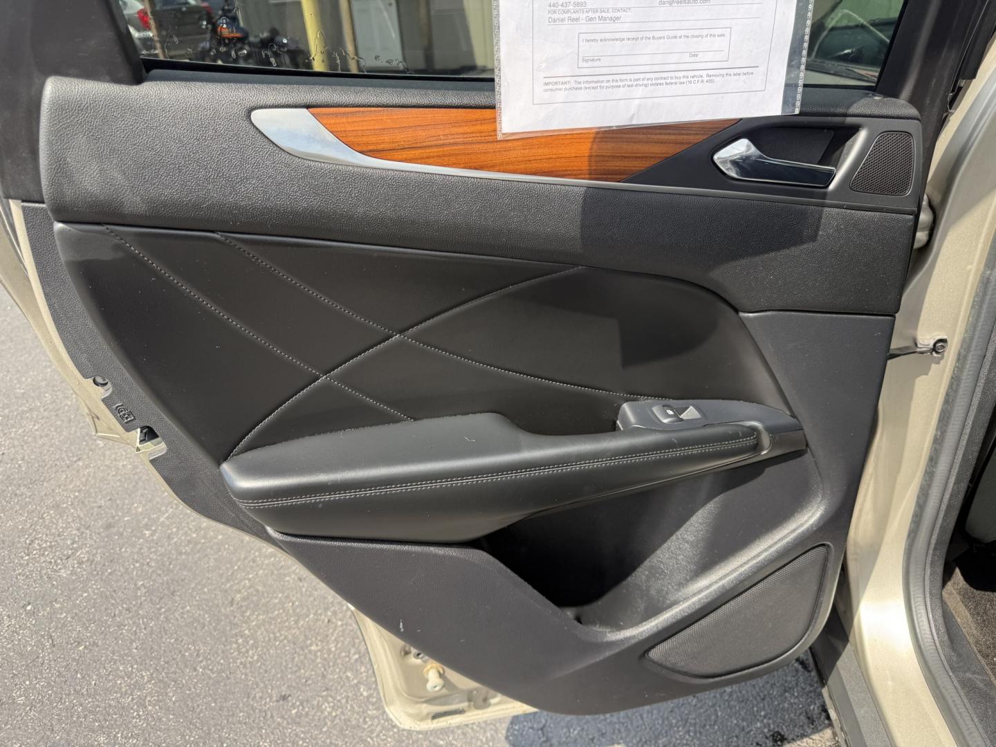 2015 Tan /Black Lincoln MKC Reserve AWD (5LMTJ2AHXFU) with an 2.3L I4 DOHC 16V Turbo engine, Automatic transmission, located at 547 E. Main St., Orwell, OH, 44076, (440) 437-5893, 41.535435, -80.847855 - 2015 Lincoln MKC Reserve AWD – Compact Luxury with Comfort and Everyday Convenience If you want a smaller luxury SUV that still feels well appointed, this 2015 Lincoln MKC Reserve AWD is a strong option. The 2.3L EcoBoost engine and 6-speed automatic deliver responsive power with available AWD fo- Photo#39