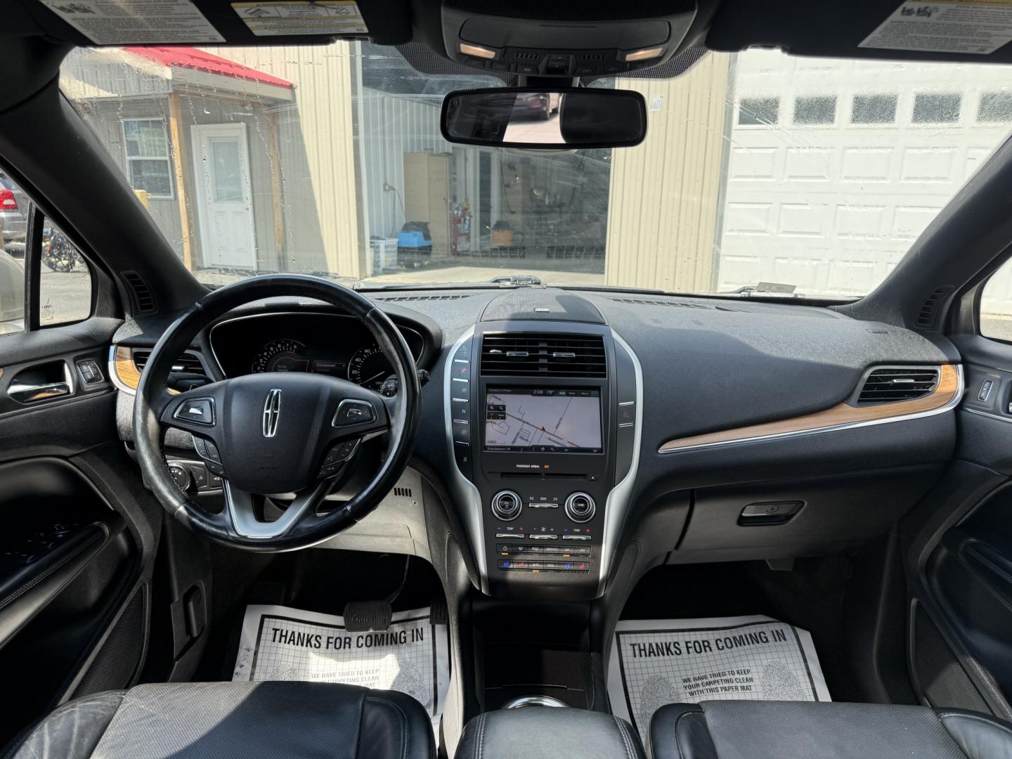 2015 Tan /Black Lincoln MKC Reserve AWD (5LMTJ2AHXFU) with an 2.3L I4 DOHC 16V Turbo engine, Automatic transmission, located at 547 E. Main St., Orwell, OH, 44076, (440) 437-5893, 41.535435, -80.847855 - 2015 Lincoln MKC Reserve AWD – Compact Luxury with Comfort and Everyday Convenience If you want a smaller luxury SUV that still feels well appointed, this 2015 Lincoln MKC Reserve AWD is a strong option. The 2.3L EcoBoost engine and 6-speed automatic deliver responsive power with available AWD fo- Photo#26