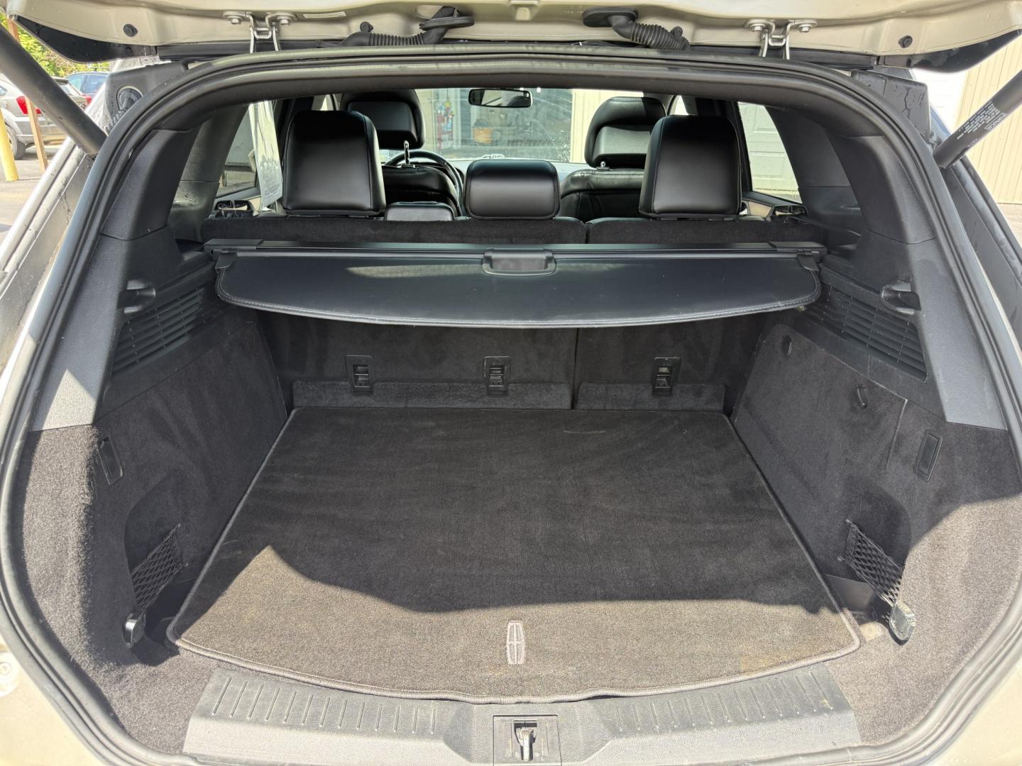 2015 Tan /Black Lincoln MKC Reserve AWD (5LMTJ2AHXFU) with an 2.3L I4 DOHC 16V Turbo engine, Automatic transmission, located at 547 E. Main St., Orwell, OH, 44076, (440) 437-5893, 41.535435, -80.847855 - 2015 Lincoln MKC Reserve AWD – Compact Luxury with Comfort and Everyday Convenience If you want a smaller luxury SUV that still feels well appointed, this 2015 Lincoln MKC Reserve AWD is a strong option. The 2.3L EcoBoost engine and 6-speed automatic deliver responsive power with available AWD fo- Photo#27