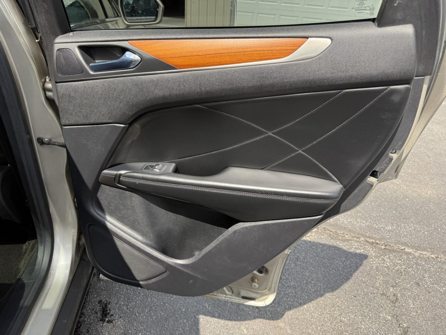 2015 Tan /Black Lincoln MKC Reserve AWD (5LMTJ2AHXFU) with an 2.3L I4 DOHC 16V Turbo engine, Automatic transmission, located at 547 E. Main St., Orwell, OH, 44076, (440) 437-5893, 41.535435, -80.847855 - 2015 Lincoln MKC Reserve AWD – Compact Luxury with Comfort and Everyday Convenience If you want a smaller luxury SUV that still feels well appointed, this 2015 Lincoln MKC Reserve AWD is a strong option. The 2.3L EcoBoost engine and 6-speed automatic deliver responsive power with available AWD fo- Photo#41
