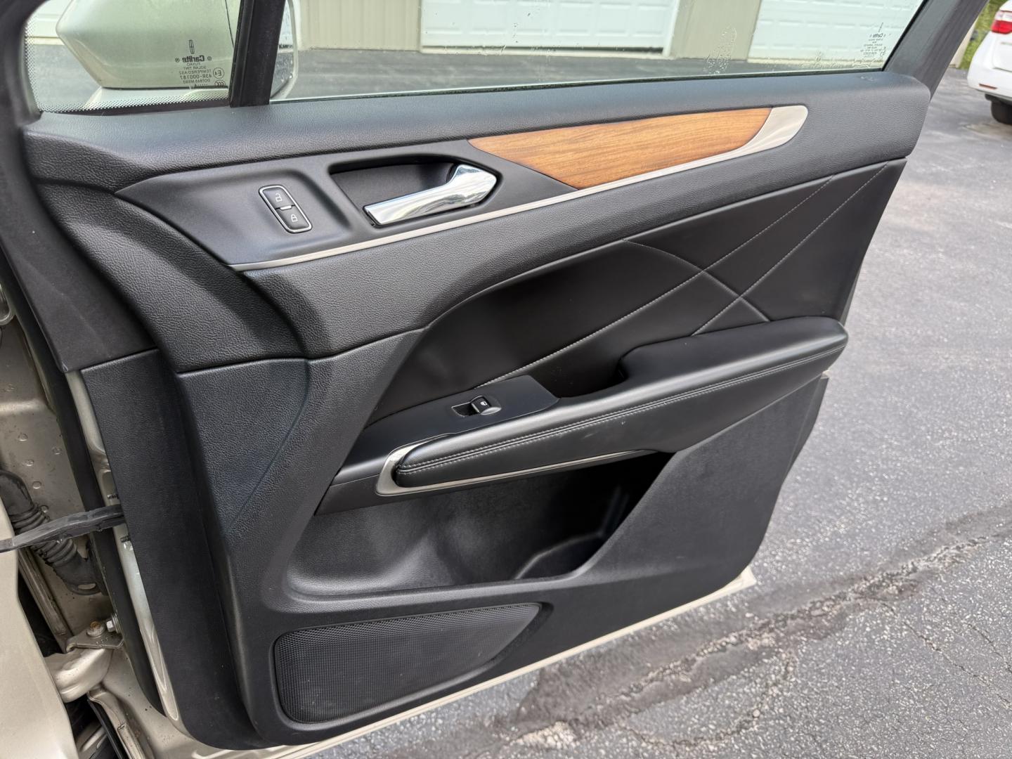 2015 Tan /Black Lincoln MKC Reserve AWD (5LMTJ2AHXFU) with an 2.3L I4 DOHC 16V Turbo engine, Automatic transmission, located at 547 E. Main St., Orwell, OH, 44076, (440) 437-5893, 41.535435, -80.847855 - 2015 Lincoln MKC Reserve AWD – Compact Luxury with Comfort and Everyday Convenience If you want a smaller luxury SUV that still feels well appointed, this 2015 Lincoln MKC Reserve AWD is a strong option. The 2.3L EcoBoost engine and 6-speed automatic deliver responsive power with available AWD fo- Photo#46