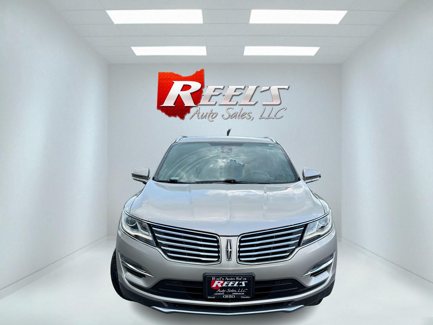2015 Tan /Black Lincoln MKC Reserve AWD (5LMTJ2AHXFU) with an 2.3L I4 DOHC 16V Turbo engine, Automatic transmission, located at 547 E. Main St., Orwell, OH, 44076, (440) 437-5893, 41.535435, -80.847855 - 2015 Lincoln MKC Reserve AWD – Compact Luxury with Comfort and Everyday Convenience If you want a smaller luxury SUV that still feels well appointed, this 2015 Lincoln MKC Reserve AWD is a strong option. The 2.3L EcoBoost engine and 6-speed automatic deliver responsive power with available AWD fo- Photo#2