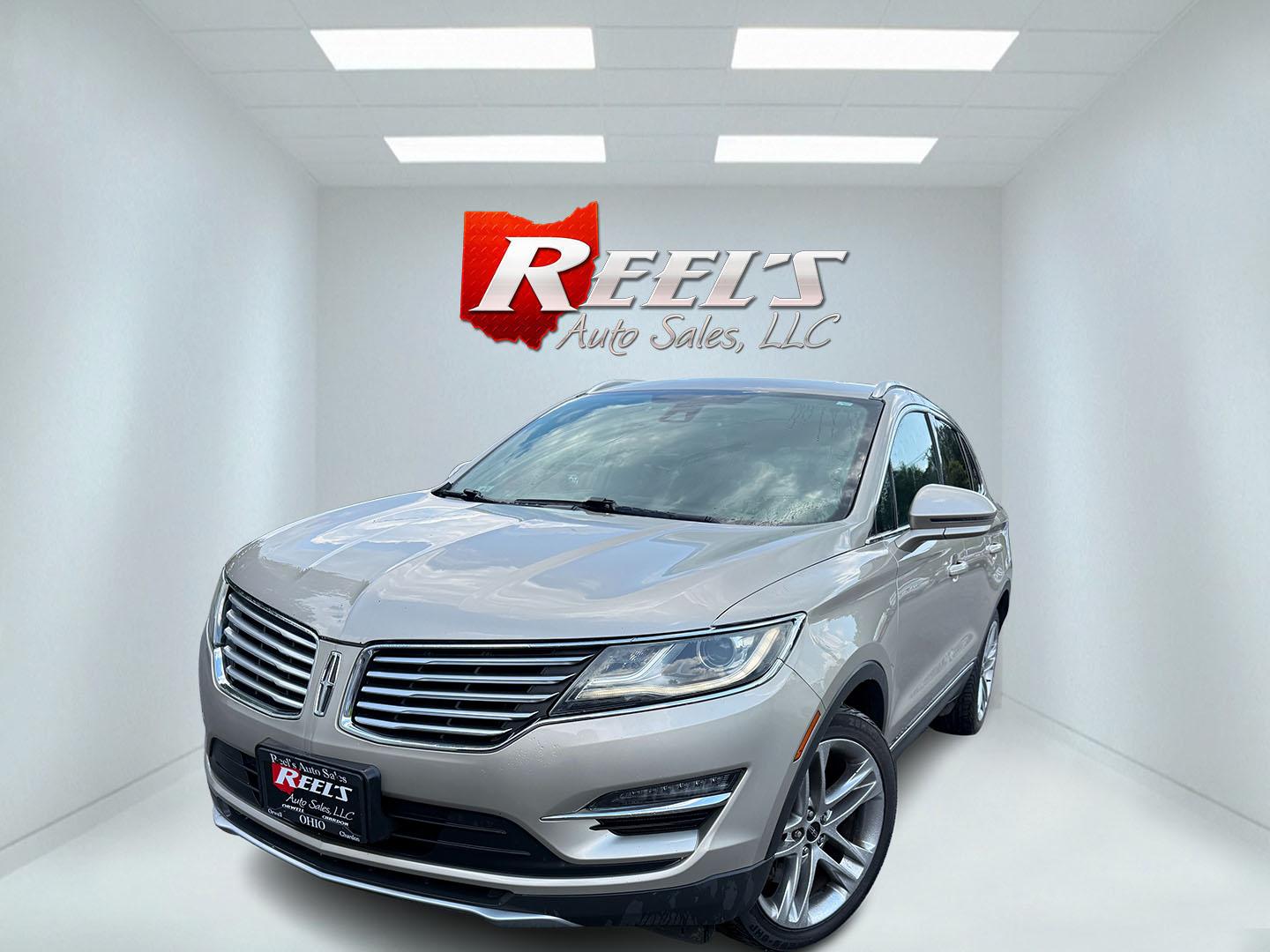 2015 Tan /Black Lincoln MKC Reserve AWD (5LMTJ2AHXFU) with an 2.3L I4 DOHC 16V Turbo engine, Automatic transmission, located at 547 E. Main St., Orwell, OH, 44076, (440) 437-5893, 41.535435, -80.847855 - 2015 Lincoln MKC Reserve AWD – Compact Luxury with Comfort and Everyday Convenience If you want a smaller luxury SUV that still feels well appointed, this 2015 Lincoln MKC Reserve AWD is a strong option. The 2.3L EcoBoost engine and 6-speed automatic deliver responsive power with available AWD fo- Photo#0