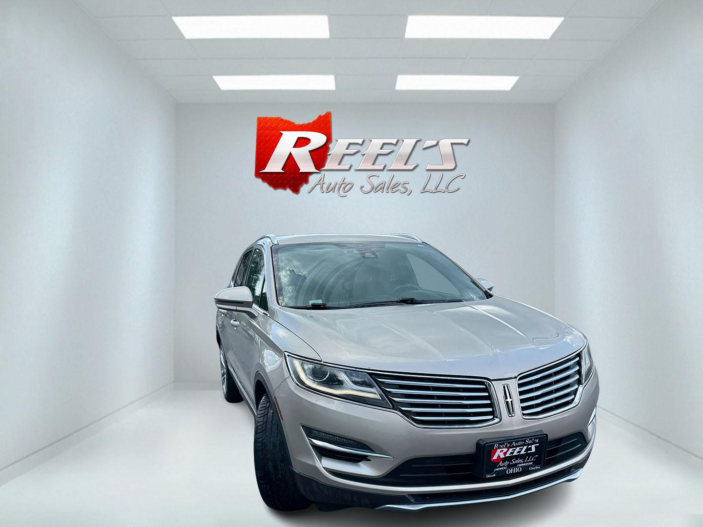 2015 Tan /Black Lincoln MKC Reserve AWD (5LMTJ2AHXFU) with an 2.3L I4 DOHC 16V Turbo engine, Automatic transmission, located at 547 E. Main St., Orwell, OH, 44076, (440) 437-5893, 41.535435, -80.847855 - 2015 Lincoln MKC Reserve AWD – Compact Luxury with Comfort and Everyday Convenience If you want a smaller luxury SUV that still feels well appointed, this 2015 Lincoln MKC Reserve AWD is a strong option. The 2.3L EcoBoost engine and 6-speed automatic deliver responsive power with available AWD fo- Photo#3