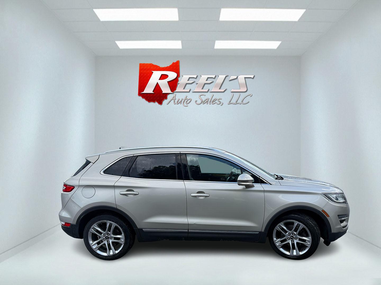 2015 Tan /Black Lincoln MKC Reserve AWD (5LMTJ2AHXFU) with an 2.3L I4 DOHC 16V Turbo engine, Automatic transmission, located at 547 E. Main St., Orwell, OH, 44076, (440) 437-5893, 41.535435, -80.847855 - 2015 Lincoln MKC Reserve AWD – Compact Luxury with Comfort and Everyday Convenience If you want a smaller luxury SUV that still feels well appointed, this 2015 Lincoln MKC Reserve AWD is a strong option. The 2.3L EcoBoost engine and 6-speed automatic deliver responsive power with available AWD fo- Photo#30