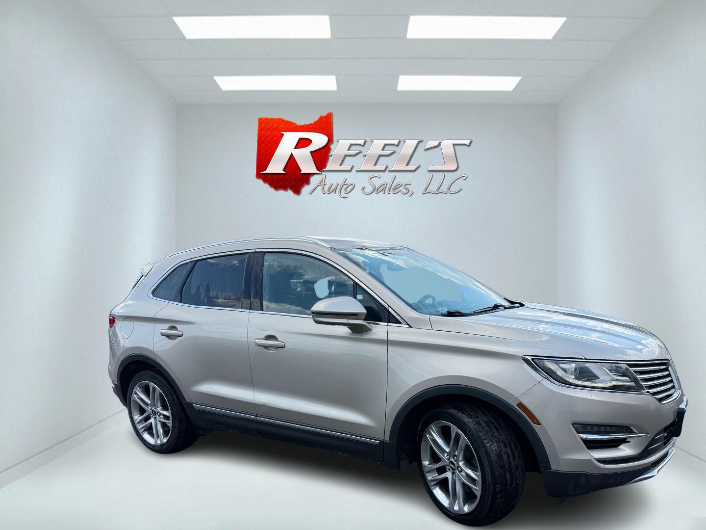 2015 Tan /Black Lincoln MKC Reserve AWD (5LMTJ2AHXFU) with an 2.3L I4 DOHC 16V Turbo engine, Automatic transmission, located at 547 E. Main St., Orwell, OH, 44076, (440) 437-5893, 41.535435, -80.847855 - 2015 Lincoln MKC Reserve AWD – Compact Luxury with Comfort and Everyday Convenience If you want a smaller luxury SUV that still feels well appointed, this 2015 Lincoln MKC Reserve AWD is a strong option. The 2.3L EcoBoost engine and 6-speed automatic deliver responsive power with available AWD fo- Photo#4