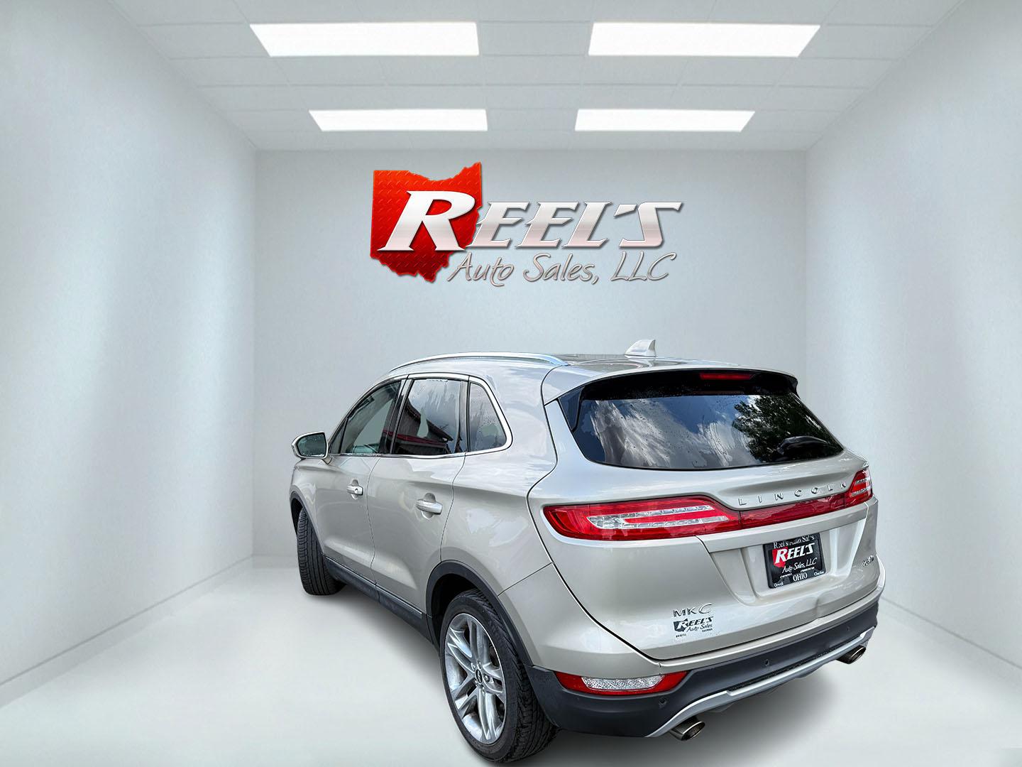 2015 Tan /Black Lincoln MKC Reserve AWD (5LMTJ2AHXFU) with an 2.3L I4 DOHC 16V Turbo engine, Automatic transmission, located at 547 E. Main St., Orwell, OH, 44076, (440) 437-5893, 41.535435, -80.847855 - 2015 Lincoln MKC Reserve AWD – Compact Luxury with Comfort and Everyday Convenience If you want a smaller luxury SUV that still feels well appointed, this 2015 Lincoln MKC Reserve AWD is a strong option. The 2.3L EcoBoost engine and 6-speed automatic deliver responsive power with available AWD fo- Photo#34