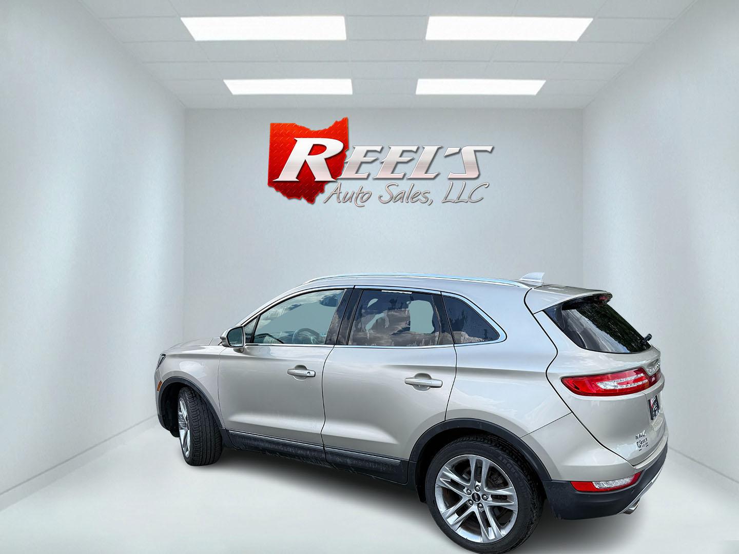2015 Tan /Black Lincoln MKC Reserve AWD (5LMTJ2AHXFU) with an 2.3L I4 DOHC 16V Turbo engine, Automatic transmission, located at 547 E. Main St., Orwell, OH, 44076, (440) 437-5893, 41.535435, -80.847855 - 2015 Lincoln MKC Reserve AWD – Compact Luxury with Comfort and Everyday Convenience If you want a smaller luxury SUV that still feels well appointed, this 2015 Lincoln MKC Reserve AWD is a strong option. The 2.3L EcoBoost engine and 6-speed automatic deliver responsive power with available AWD fo- Photo#35