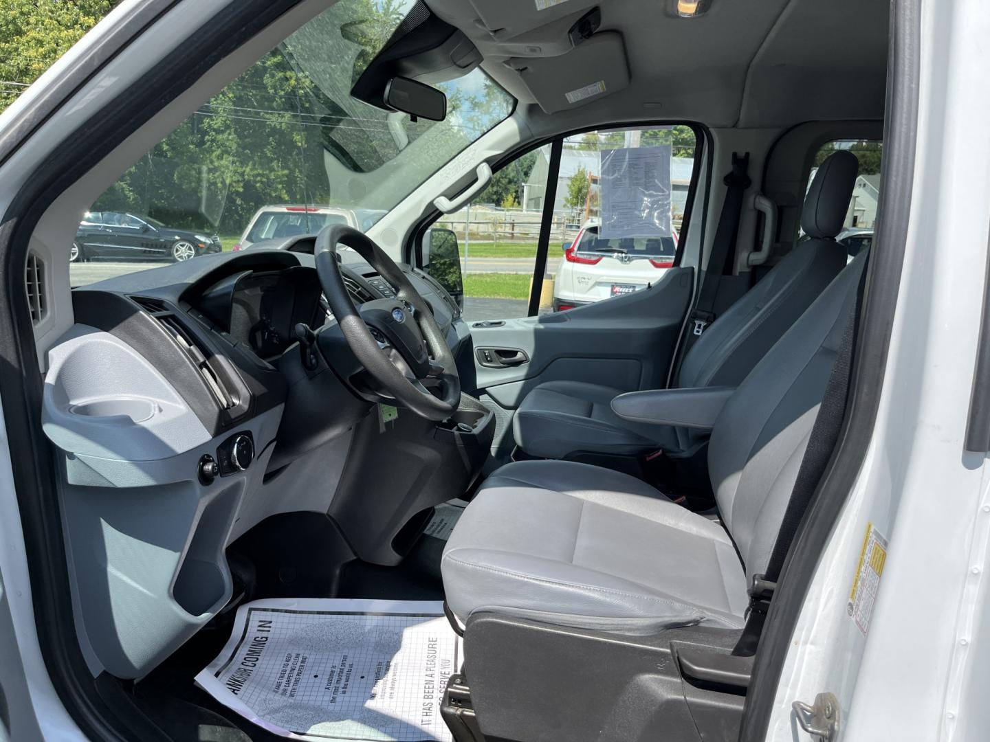 2018 White /Gray Ford Transit 150 Wagon Low Roof XL w/Sliding Pass. 130-in. WB (1FMZK1YM2JK) with an 3.7L V6 DOHC 24V engine, Automatic transmission, located at 11115 Chardon Rd. , Chardon, OH, 44024, (440) 214-9705, 41.580246, -81.241943 - 2018 Ford Transit T-150 Passenger Van – Practical 8-Passenger Capability with Everyday Utility If you need a van that can move people and still handle light work, this 2018 Ford Transit T-150 Passenger Van is a straightforward choice. The 3.7L V6 and 6-speed automatic deliver dependable power wit- Photo#17
