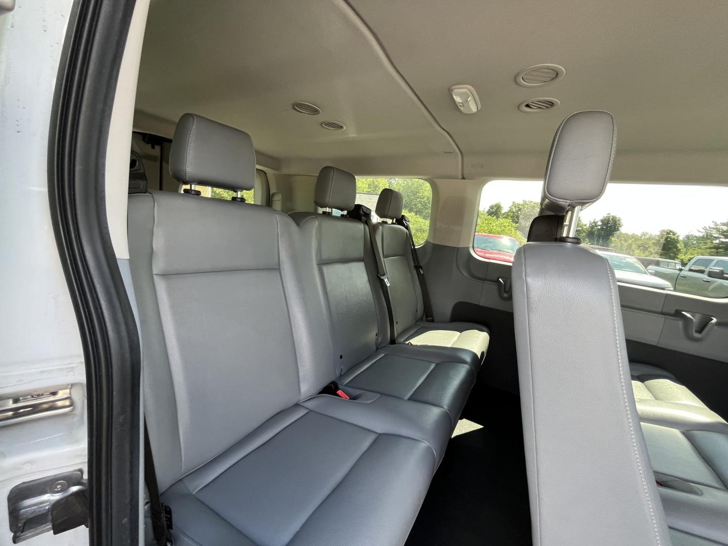 2018 White /Gray Ford Transit 150 Wagon Low Roof XL w/Sliding Pass. 130-in. WB (1FMZK1YM2JK) with an 3.7L V6 DOHC 24V engine, Automatic transmission, located at 11115 Chardon Rd. , Chardon, OH, 44024, (440) 214-9705, 41.580246, -81.241943 - 2018 Ford Transit T-150 Passenger Van – Practical 8-Passenger Capability with Everyday Utility If you need a van that can move people and still handle light work, this 2018 Ford Transit T-150 Passenger Van is a straightforward choice. The 3.7L V6 and 6-speed automatic deliver dependable power wit- Photo#29