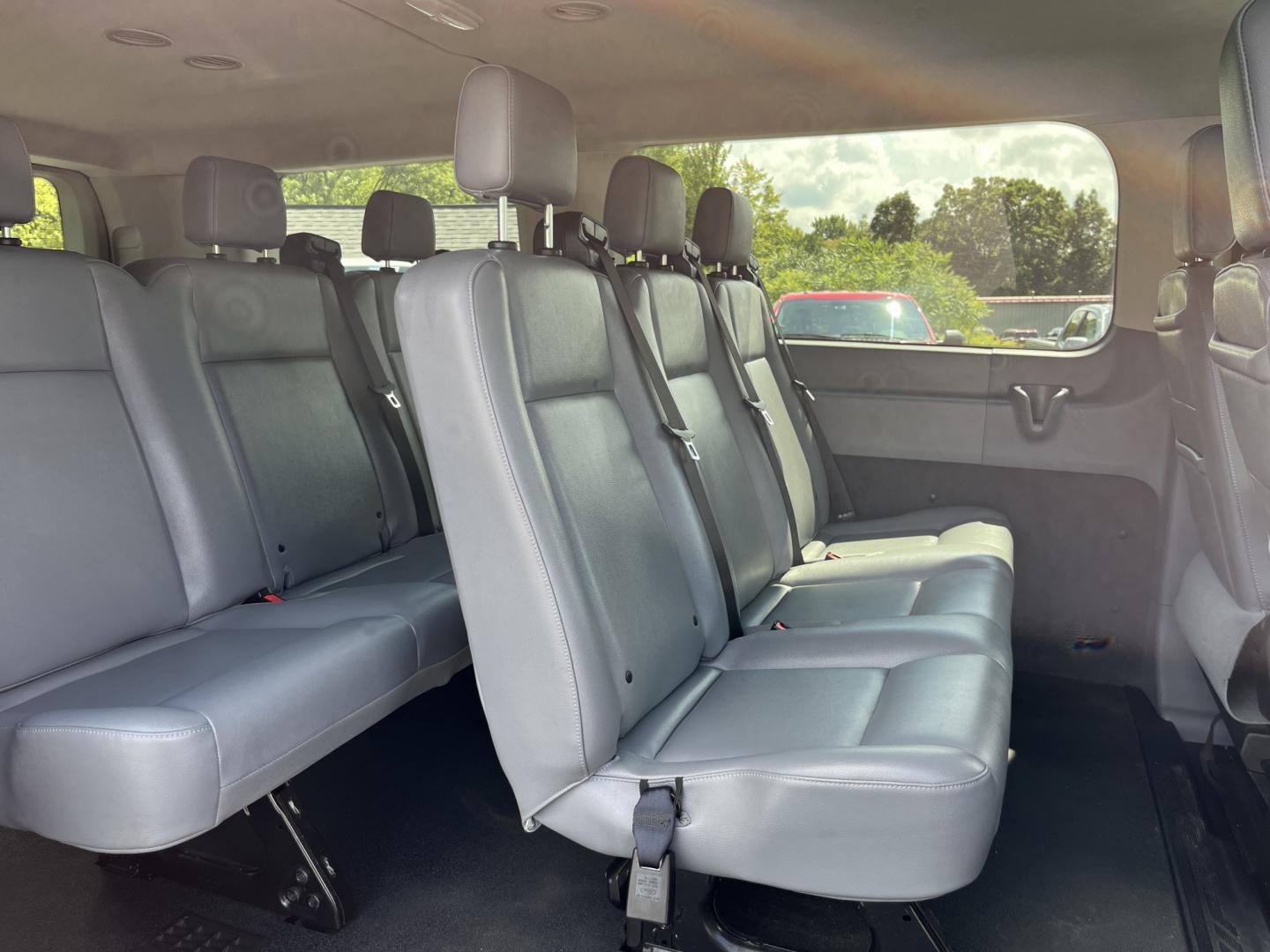 2018 White /Gray Ford Transit 150 Wagon Low Roof XL w/Sliding Pass. 130-in. WB (1FMZK1YM2JK) with an 3.7L V6 DOHC 24V engine, Automatic transmission, located at 11115 Chardon Rd. , Chardon, OH, 44024, (440) 214-9705, 41.580246, -81.241943 - 2018 Ford Transit T-150 Passenger Van – Practical 8-Passenger Capability with Everyday Utility If you need a van that can move people and still handle light work, this 2018 Ford Transit T-150 Passenger Van is a straightforward choice. The 3.7L V6 and 6-speed automatic deliver dependable power wit- Photo#28