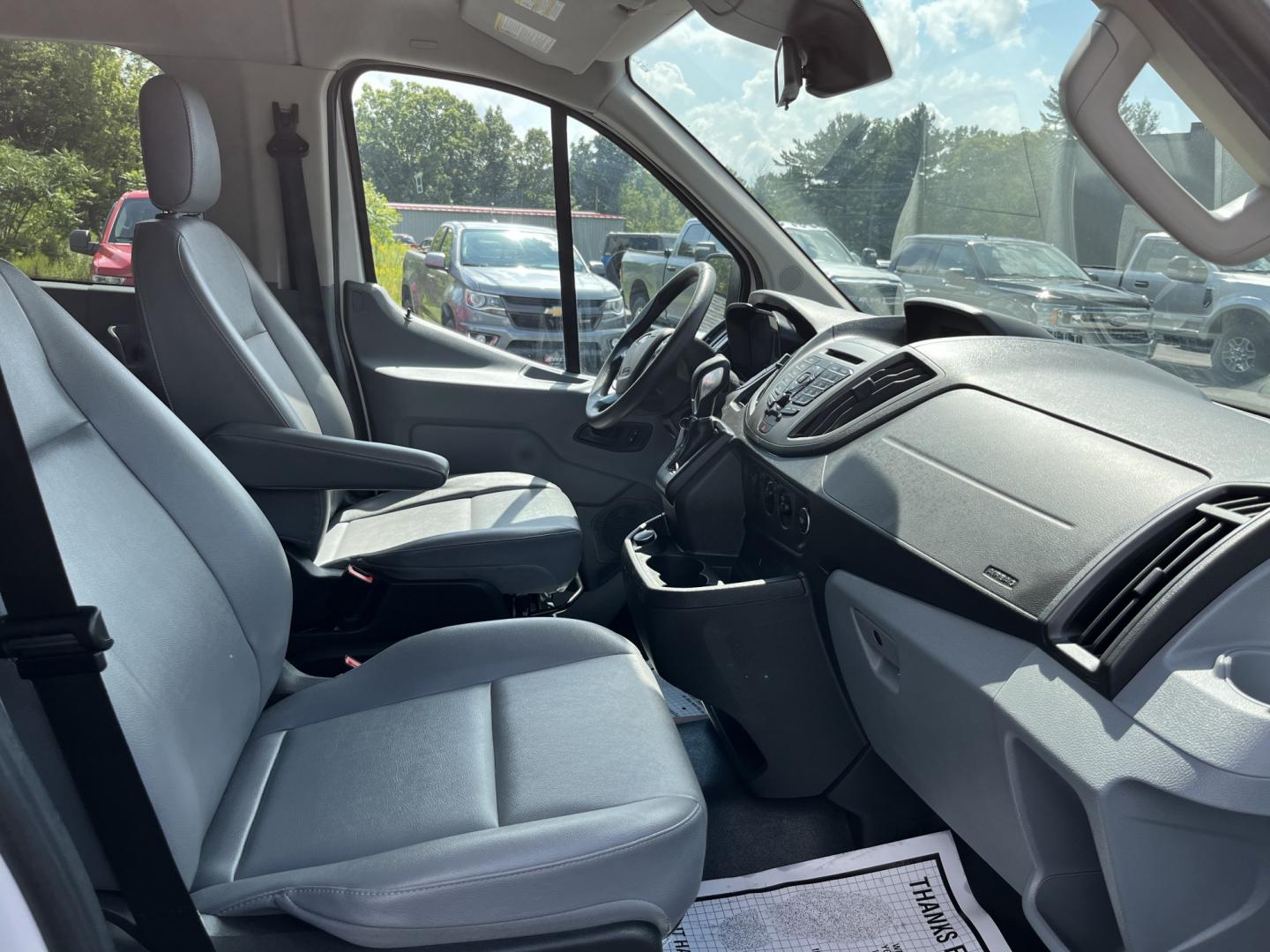 2018 White /Gray Ford Transit 150 Wagon Low Roof XL w/Sliding Pass. 130-in. WB (1FMZK1YM2JK) with an 3.7L V6 DOHC 24V engine, Automatic transmission, located at 11115 Chardon Rd. , Chardon, OH, 44024, (440) 214-9705, 41.580246, -81.241943 - 2018 Ford Transit T-150 Passenger Van – Practical 8-Passenger Capability with Everyday Utility If you need a van that can move people and still handle light work, this 2018 Ford Transit T-150 Passenger Van is a straightforward choice. The 3.7L V6 and 6-speed automatic deliver dependable power wit- Photo#32