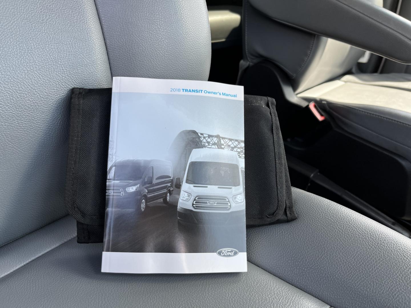 2018 White /Gray Ford Transit 150 Wagon Low Roof XL w/Sliding Pass. 130-in. WB (1FMZK1YM2JK) with an 3.7L V6 DOHC 24V engine, Automatic transmission, located at 11115 Chardon Rd. , Chardon, OH, 44024, (440) 214-9705, 41.580246, -81.241943 - 2018 Ford Transit T-150 Passenger Van – Practical 8-Passenger Capability with Everyday Utility If you need a van that can move people and still handle light work, this 2018 Ford Transit T-150 Passenger Van is a straightforward choice. The 3.7L V6 and 6-speed automatic deliver dependable power wit- Photo#35
