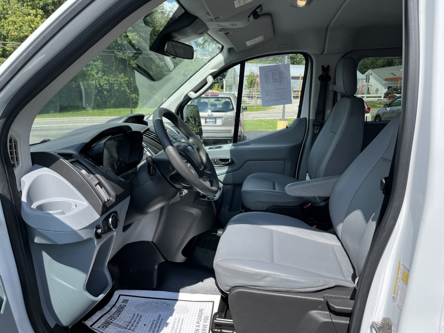 2018 White /Black Ford Transit 150 Wagon Low Roof XL w/Sliding Pass. 130-in. WB (1FMZK1YM4JK) with an 3.7L V6 DOHC 24V engine, Automatic transmission, located at 11115 Chardon Rd. , Chardon, OH, 44024, (440) 214-9705, 41.580246, -81.241943 - 2018 Ford Transit T-150 Passenger Van – Practical 8-Passenger Capability with Everyday Utility If you need a van that can move people and still handle light work, this 2018 Ford Transit T-150 Passenger Van is a straightforward choice. The 3.7L V6 and 6-speed automatic deliver dependable power wit- Photo#17