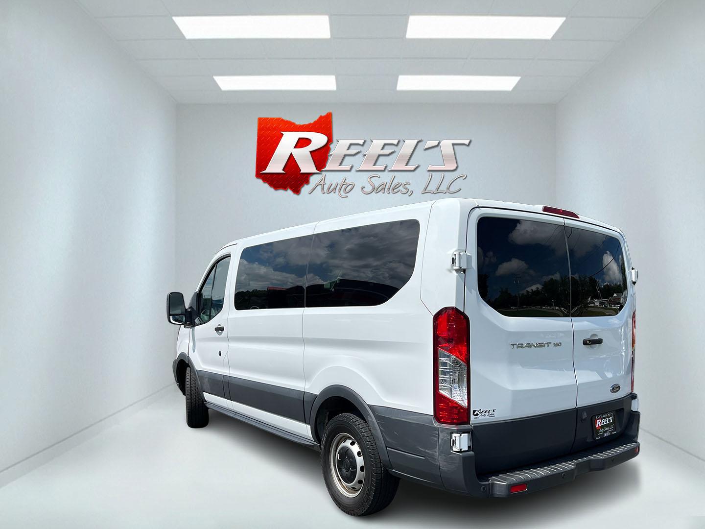 2018 White /Black Ford Transit 150 Wagon Low Roof XL w/Sliding Pass. 130-in. WB (1FMZK1YM4JK) with an 3.7L V6 DOHC 24V engine, Automatic transmission, located at 11115 Chardon Rd. , Chardon, OH, 44024, (440) 214-9705, 41.580246, -81.241943 - 2018 Ford Transit T-150 Passenger Van – Practical 8-Passenger Capability with Everyday Utility If you need a van that can move people and still handle light work, this 2018 Ford Transit T-150 Passenger Van is a straightforward choice. The 3.7L V6 and 6-speed automatic deliver dependable power wit- Photo#10