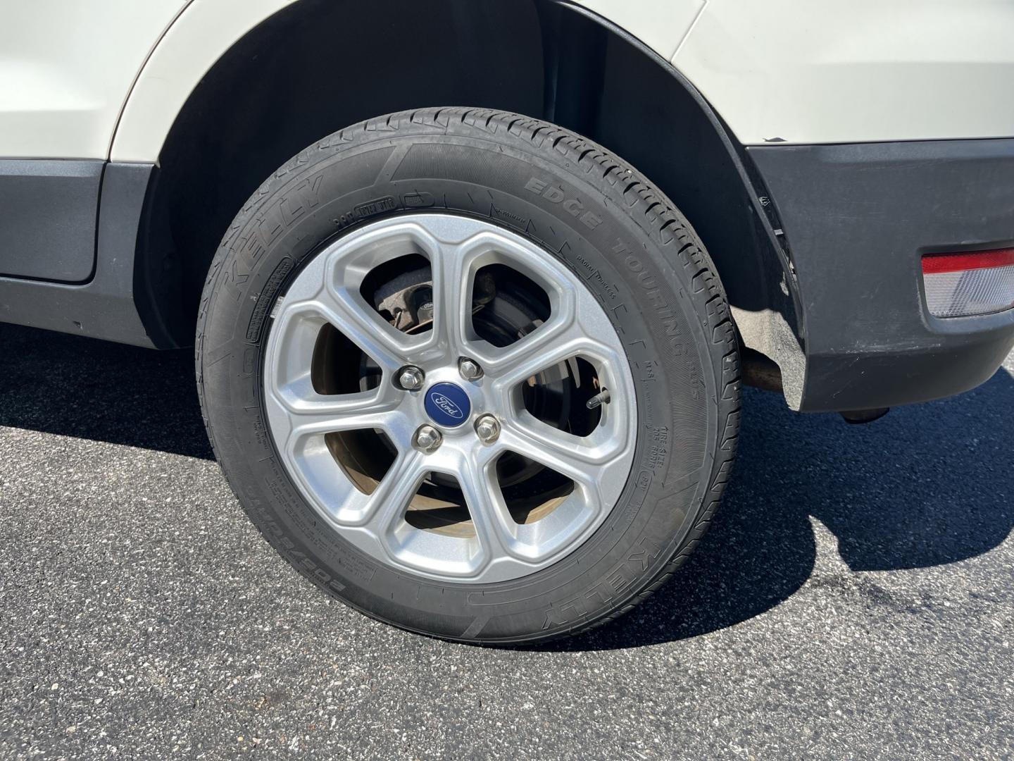 2021 White /Black Ford EcoSport SE AWD (MAJ6S3GL1MC) with an 2.0L I4 DOHC 16V engine, Automatic transmission, located at 11115 Chardon Rd. , Chardon, OH, 44024, (440) 214-9705, 41.580246, -81.241943 - 2021 Ford EcoSport SE 4WD – Compact Size with All-Weather Capability and Everyday Convenience If you want a smaller SUV that is easy to park and still useful in changing conditions, this 2021 Ford EcoSport SE 4WD is a practical choice. The 2.0L Duratec engine and 6-speed automatic deliver smooth- Photo#11