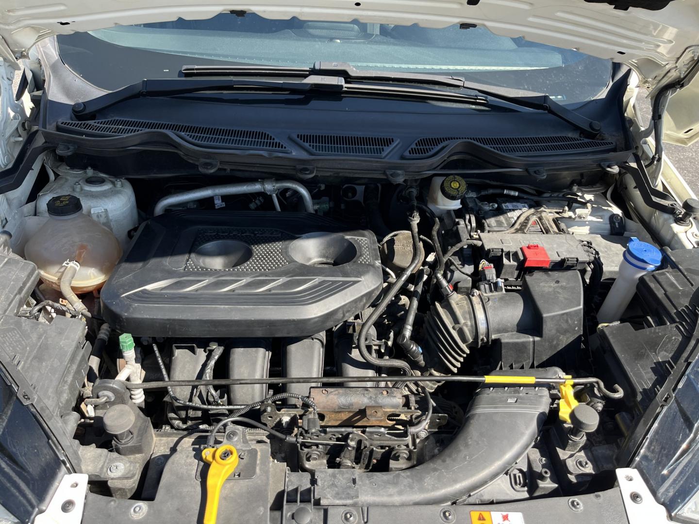2021 White /Black Ford EcoSport SE AWD (MAJ6S3GL1MC) with an 2.0L I4 DOHC 16V engine, Automatic transmission, located at 11115 Chardon Rd. , Chardon, OH, 44024, (440) 214-9705, 41.580246, -81.241943 - 2021 Ford EcoSport SE 4WD – Compact Size with All-Weather Capability and Everyday Convenience If you want a smaller SUV that is easy to park and still useful in changing conditions, this 2021 Ford EcoSport SE 4WD is a practical choice. The 2.0L Duratec engine and 6-speed automatic deliver smooth- Photo#14