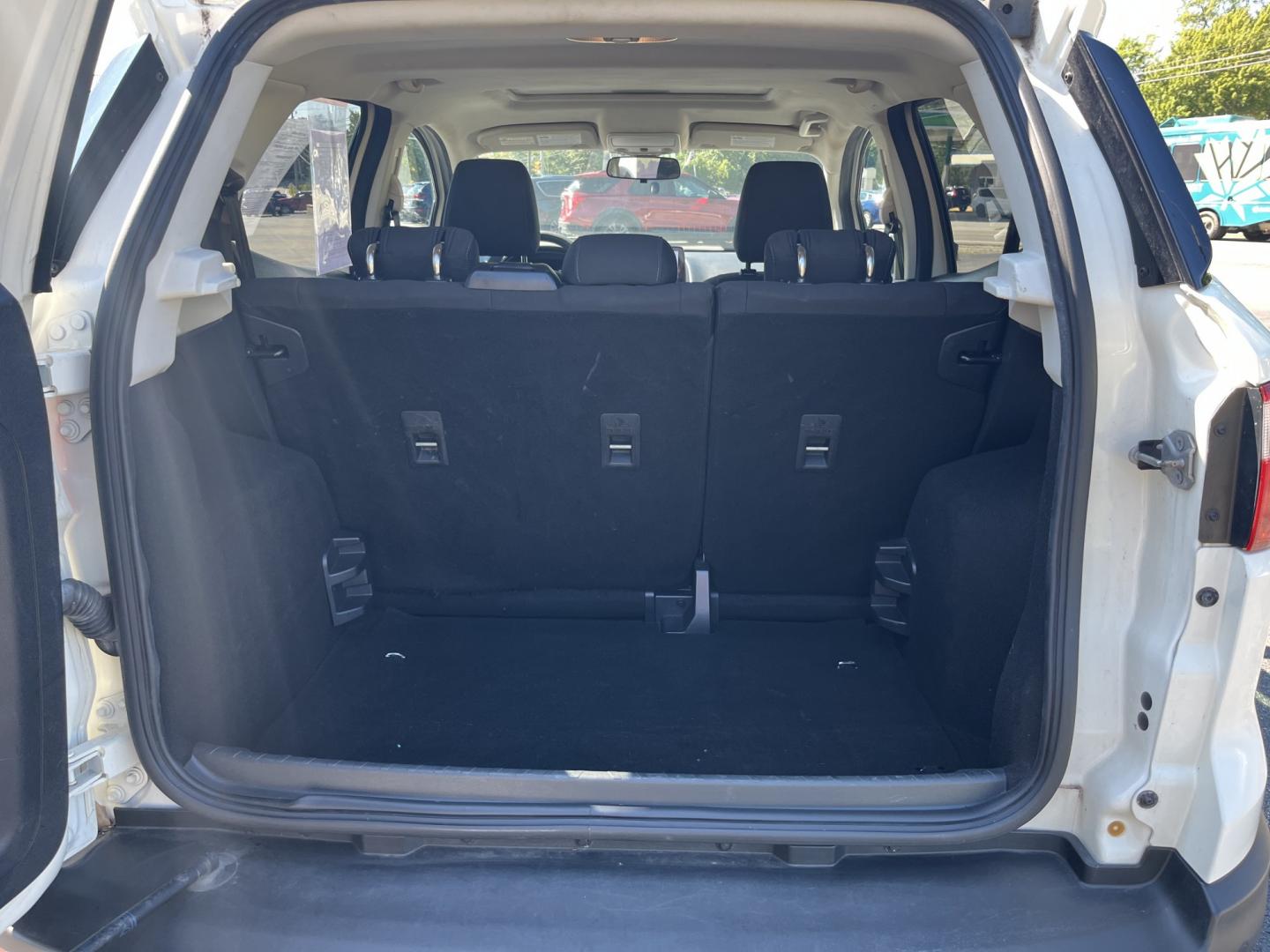 2021 White /Black Ford EcoSport SE AWD (MAJ6S3GL1MC) with an 2.0L I4 DOHC 16V engine, Automatic transmission, located at 11115 Chardon Rd. , Chardon, OH, 44024, (440) 214-9705, 41.580246, -81.241943 - 2021 Ford EcoSport SE 4WD – Compact Size with All-Weather Capability and Everyday Convenience If you want a smaller SUV that is easy to park and still useful in changing conditions, this 2021 Ford EcoSport SE 4WD is a practical choice. The 2.0L Duratec engine and 6-speed automatic deliver smooth- Photo#15