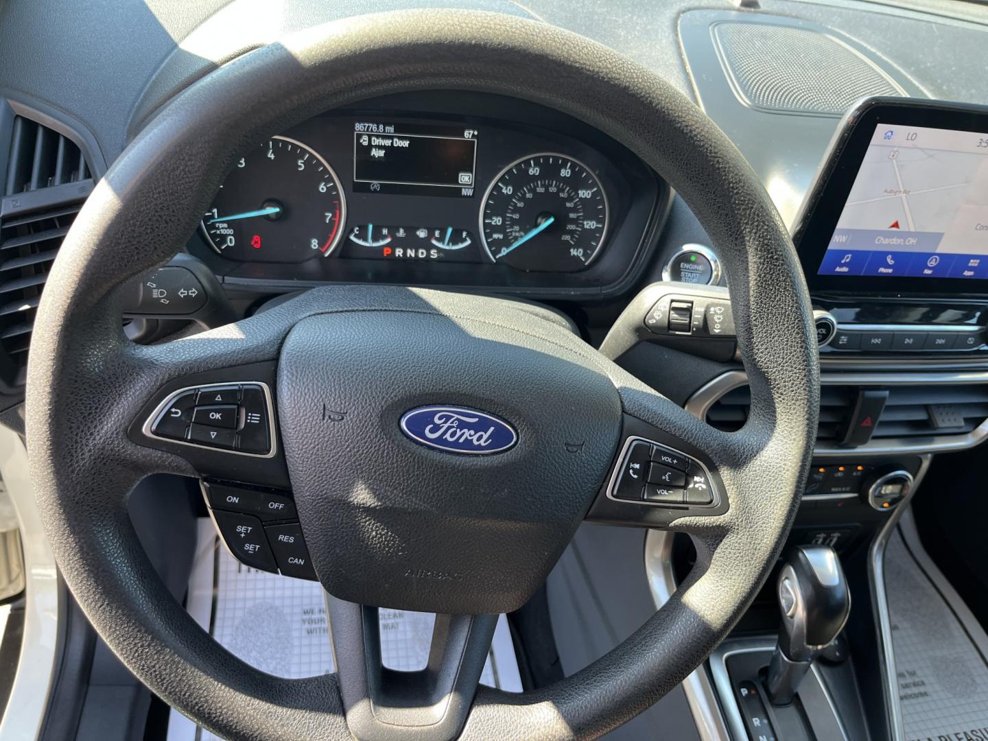 2021 White /Black Ford EcoSport SE AWD (MAJ6S3GL1MC) with an 2.0L I4 DOHC 16V engine, Automatic transmission, located at 11115 Chardon Rd. , Chardon, OH, 44024, (440) 214-9705, 41.580246, -81.241943 - 2021 Ford EcoSport SE 4WD – Compact Size with All-Weather Capability and Everyday Convenience If you want a smaller SUV that is easy to park and still useful in changing conditions, this 2021 Ford EcoSport SE 4WD is a practical choice. The 2.0L Duratec engine and 6-speed automatic deliver smooth- Photo#19