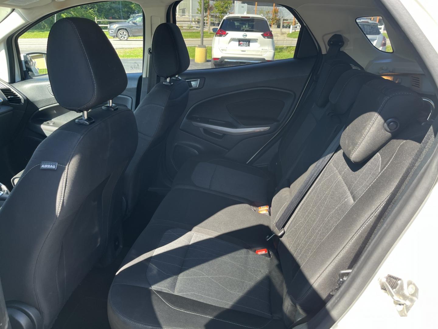 2021 White /Black Ford EcoSport SE AWD (MAJ6S3GL1MC) with an 2.0L I4 DOHC 16V engine, Automatic transmission, located at 11115 Chardon Rd. , Chardon, OH, 44024, (440) 214-9705, 41.580246, -81.241943 - 2021 Ford EcoSport SE 4WD – Compact Size with All-Weather Capability and Everyday Convenience If you want a smaller SUV that is easy to park and still useful in changing conditions, this 2021 Ford EcoSport SE 4WD is a practical choice. The 2.0L Duratec engine and 6-speed automatic deliver smooth- Photo#32