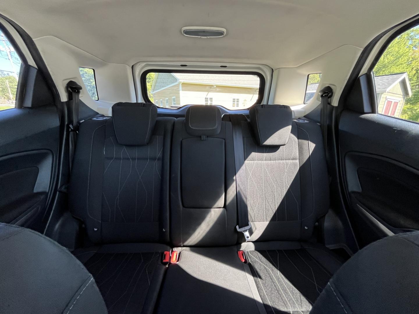2021 White /Black Ford EcoSport SE AWD (MAJ6S3GL1MC) with an 2.0L I4 DOHC 16V engine, Automatic transmission, located at 11115 Chardon Rd. , Chardon, OH, 44024, (440) 214-9705, 41.580246, -81.241943 - 2021 Ford EcoSport SE 4WD – Compact Size with All-Weather Capability and Everyday Convenience If you want a smaller SUV that is easy to park and still useful in changing conditions, this 2021 Ford EcoSport SE 4WD is a practical choice. The 2.0L Duratec engine and 6-speed automatic deliver smooth- Photo#30