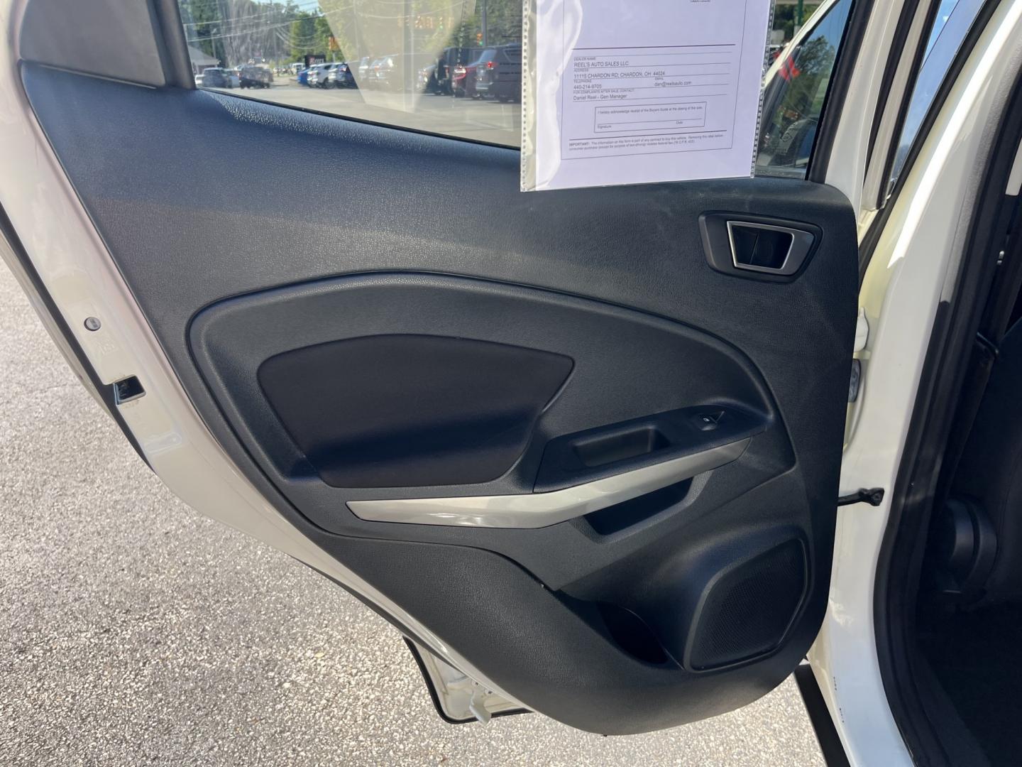 2021 White /Black Ford EcoSport SE AWD (MAJ6S3GL1MC) with an 2.0L I4 DOHC 16V engine, Automatic transmission, located at 11115 Chardon Rd. , Chardon, OH, 44024, (440) 214-9705, 41.580246, -81.241943 - 2021 Ford EcoSport SE 4WD – Compact Size with All-Weather Capability and Everyday Convenience If you want a smaller SUV that is easy to park and still useful in changing conditions, this 2021 Ford EcoSport SE 4WD is a practical choice. The 2.0L Duratec engine and 6-speed automatic deliver smooth- Photo#31
