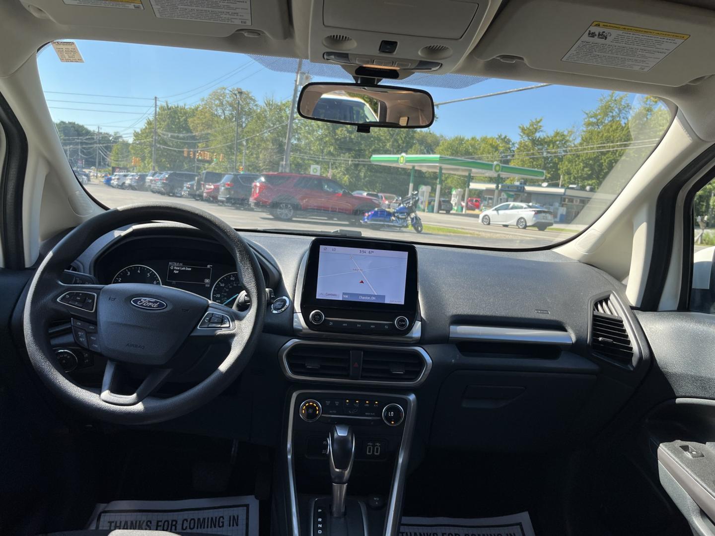 2021 White /Black Ford EcoSport SE AWD (MAJ6S3GL1MC) with an 2.0L I4 DOHC 16V engine, Automatic transmission, located at 11115 Chardon Rd. , Chardon, OH, 44024, (440) 214-9705, 41.580246, -81.241943 - 2021 Ford EcoSport SE 4WD – Compact Size with All-Weather Capability and Everyday Convenience If you want a smaller SUV that is easy to park and still useful in changing conditions, this 2021 Ford EcoSport SE 4WD is a practical choice. The 2.0L Duratec engine and 6-speed automatic deliver smooth- Photo#33