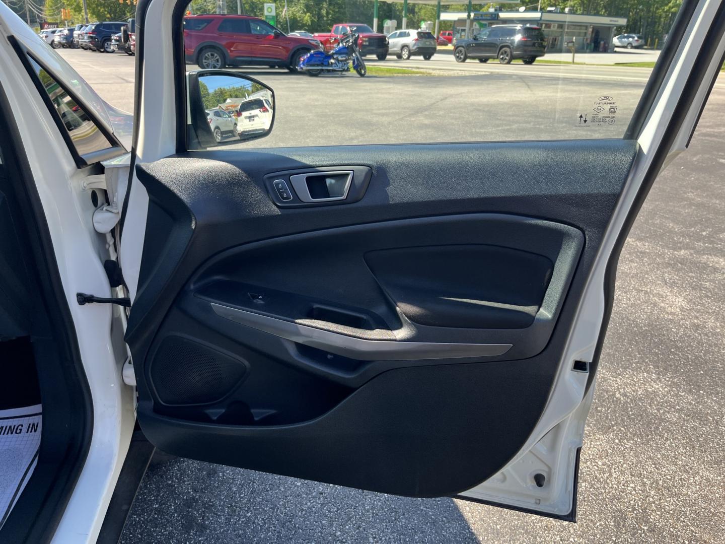 2021 White /Black Ford EcoSport SE AWD (MAJ6S3GL1MC) with an 2.0L I4 DOHC 16V engine, Automatic transmission, located at 11115 Chardon Rd. , Chardon, OH, 44024, (440) 214-9705, 41.580246, -81.241943 - 2021 Ford EcoSport SE 4WD – Compact Size with All-Weather Capability and Everyday Convenience If you want a smaller SUV that is easy to park and still useful in changing conditions, this 2021 Ford EcoSport SE 4WD is a practical choice. The 2.0L Duratec engine and 6-speed automatic deliver smooth- Photo#36