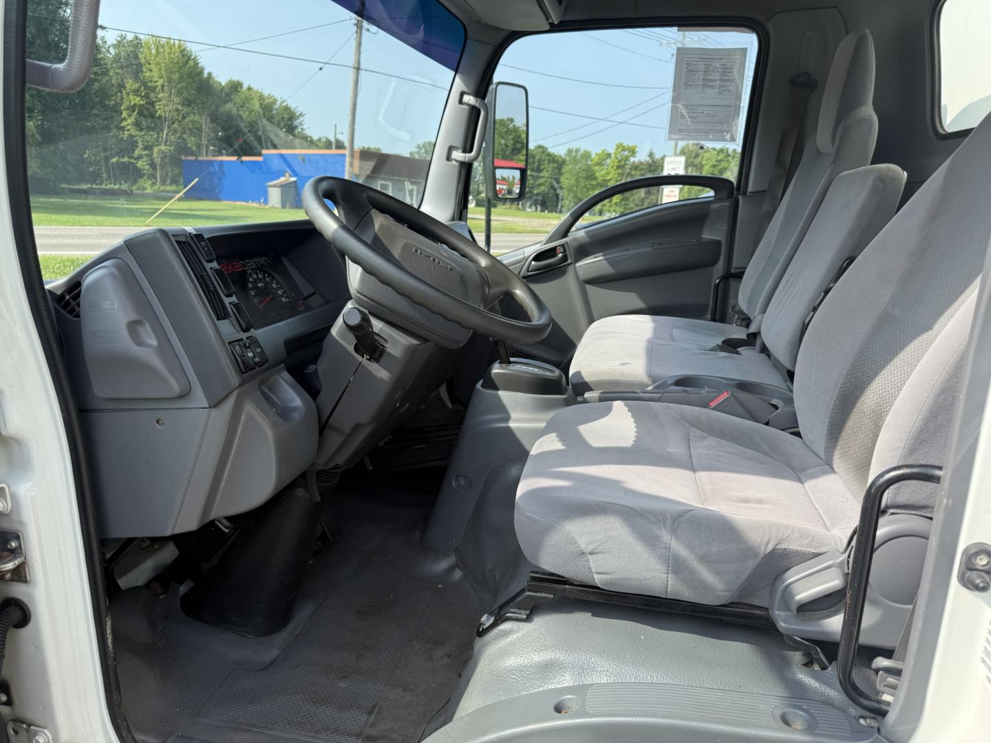 2019 White /Gray Isuzu NPR HD - (54DC4W1B4KS) with an 6.0L V8 OHV 16V engine, Automatic transmission, located at 547 E. Main St., Orwell, OH, 44076, (440) 437-5893, 41.535435, -80.847855 - 2019 Isuzu NPR HD Box Truck – Straightforward Work Truck with One-Owner History If you need a dependable box truck for deliveries or job-site use, this 2019 Isuzu NPR HD is a practical option. The 6.0L Vortec V8 and 6-speed automatic deliver the power and durability expected in a commercial truck- Photo#9