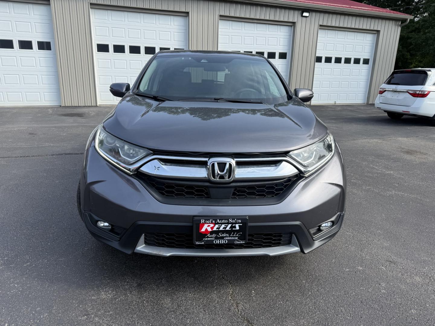 2018 Gray /Black Honda CR-V EX AWD (7FARW2H5XJE) with an 1.5L I4 16V DOHC TURBO engine, Automatic transmission, located at 547 E. Main St., Orwell, OH, 44076, (440) 437-5893, 41.535435, -80.847855 - 2018 Honda CR-V EX AWD – Efficient Compact SUV with One-Owner History and Everyday Comfort If you want a compact SUV that balances efficiency, comfort, and all-weather capability, this 2018 Honda CR-V EX AWD is a strong option. The 1.5L Turbocharged engine delivers responsive power and a solid 33- Photo#1