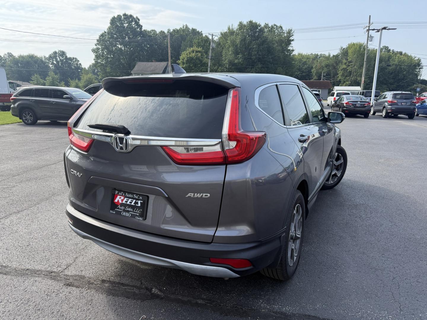 2018 Gray /Black Honda CR-V EX AWD (7FARW2H5XJE) with an 1.5L I4 16V DOHC TURBO engine, Automatic transmission, located at 547 E. Main St., Orwell, OH, 44076, (440) 437-5893, 41.535435, -80.847855 - 2018 Honda CR-V EX AWD – Efficient Compact SUV with One-Owner History and Everyday Comfort If you want a compact SUV that balances efficiency, comfort, and all-weather capability, this 2018 Honda CR-V EX AWD is a strong option. The 1.5L Turbocharged engine delivers responsive power and a solid 33- Photo#26