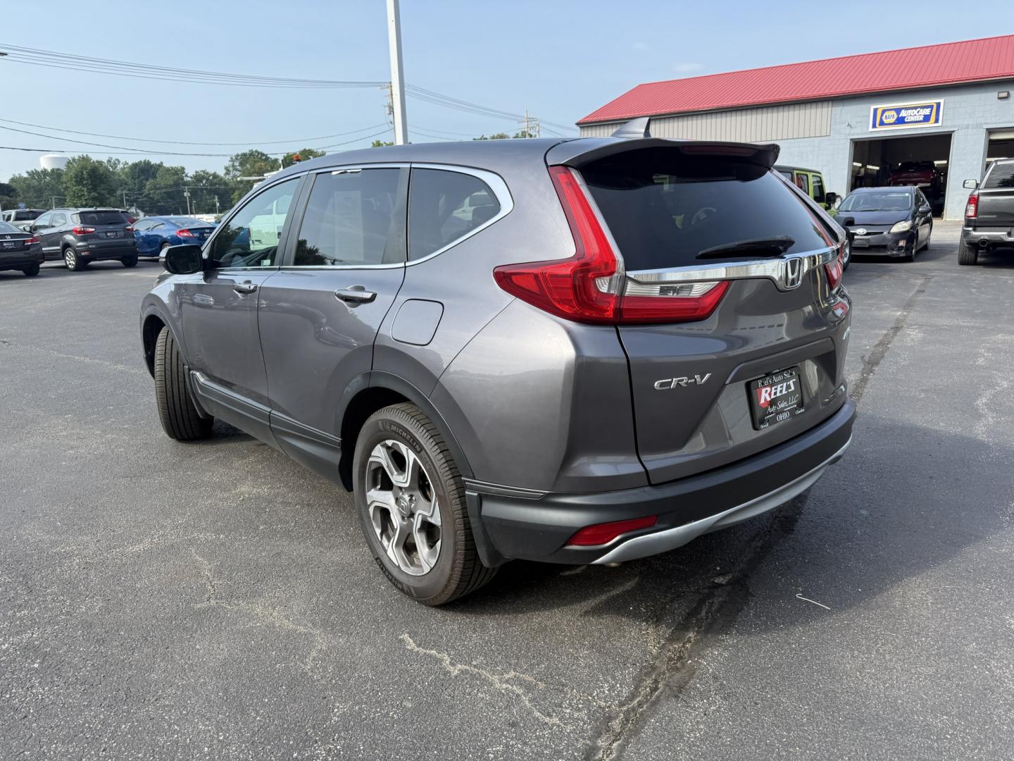 2018 Gray /Black Honda CR-V EX AWD (7FARW2H5XJE) with an 1.5L I4 16V DOHC TURBO engine, Automatic transmission, located at 547 E. Main St., Orwell, OH, 44076, (440) 437-5893, 41.535435, -80.847855 - 2018 Honda CR-V EX AWD – Efficient Compact SUV with One-Owner History and Everyday Comfort If you want a compact SUV that balances efficiency, comfort, and all-weather capability, this 2018 Honda CR-V EX AWD is a strong option. The 1.5L Turbocharged engine delivers responsive power and a solid 33- Photo#28