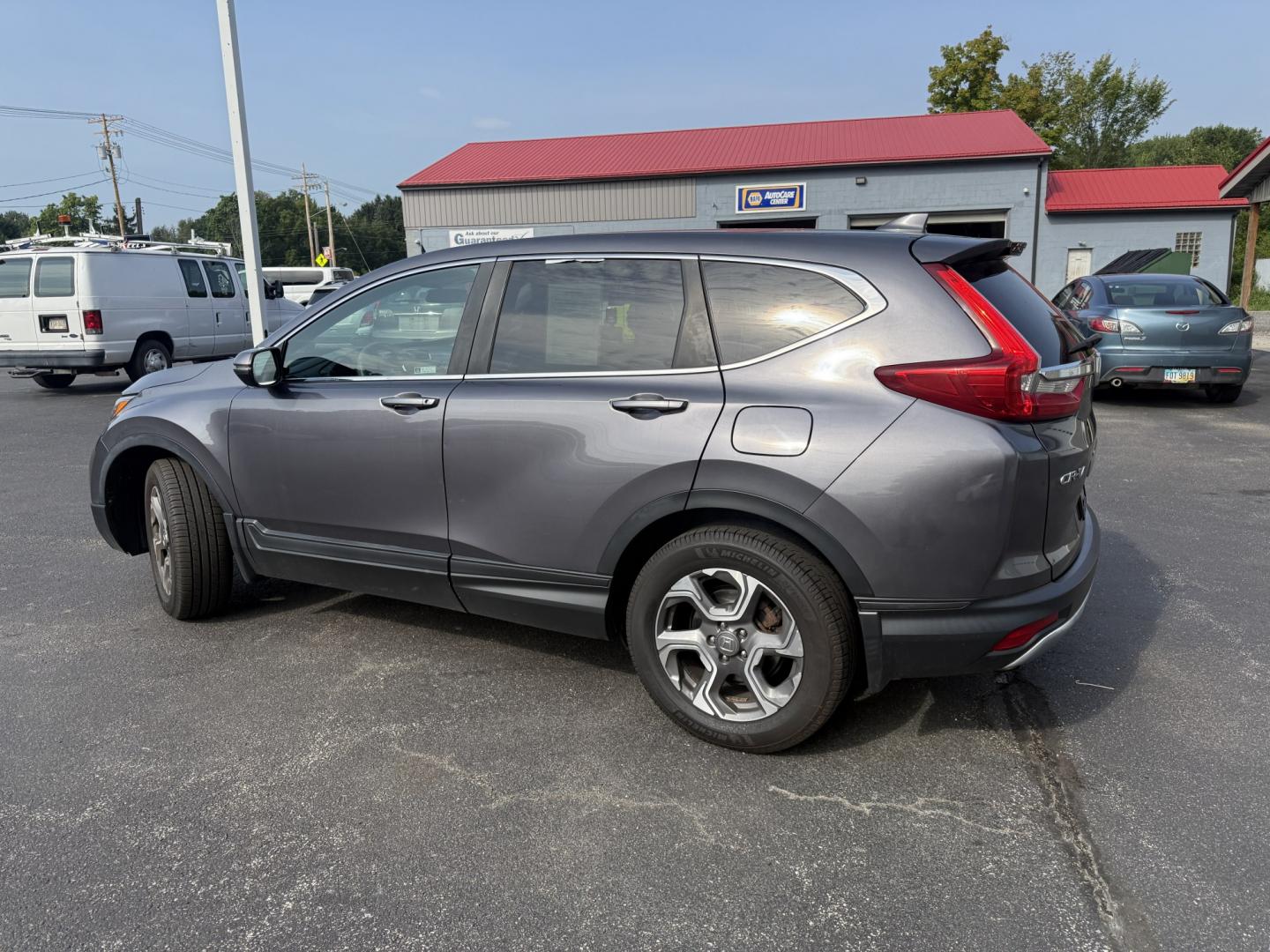 2018 Gray /Black Honda CR-V EX AWD (7FARW2H5XJE) with an 1.5L I4 16V DOHC TURBO engine, Automatic transmission, located at 547 E. Main St., Orwell, OH, 44076, (440) 437-5893, 41.535435, -80.847855 - 2018 Honda CR-V EX AWD – Efficient Compact SUV with One-Owner History and Everyday Comfort If you want a compact SUV that balances efficiency, comfort, and all-weather capability, this 2018 Honda CR-V EX AWD is a strong option. The 1.5L Turbocharged engine delivers responsive power and a solid 33- Photo#29