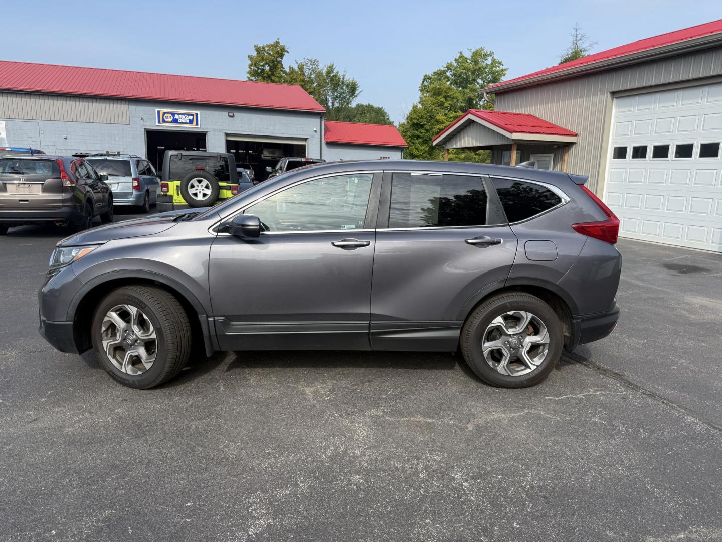 2018 Gray /Black Honda CR-V EX AWD (7FARW2H5XJE) with an 1.5L I4 16V DOHC TURBO engine, Automatic transmission, located at 547 E. Main St., Orwell, OH, 44076, (440) 437-5893, 41.535435, -80.847855 - 2018 Honda CR-V EX AWD – Efficient Compact SUV with One-Owner History and Everyday Comfort If you want a compact SUV that balances efficiency, comfort, and all-weather capability, this 2018 Honda CR-V EX AWD is a strong option. The 1.5L Turbocharged engine delivers responsive power and a solid 33- Photo#31