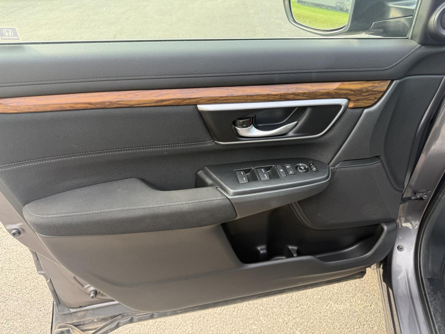 2018 Gray /Black Honda CR-V EX AWD (7FARW2H5XJE) with an 1.5L I4 16V DOHC TURBO engine, Automatic transmission, located at 547 E. Main St., Orwell, OH, 44076, (440) 437-5893, 41.535435, -80.847855 - 2018 Honda CR-V EX AWD – Efficient Compact SUV with One-Owner History and Everyday Comfort If you want a compact SUV that balances efficiency, comfort, and all-weather capability, this 2018 Honda CR-V EX AWD is a strong option. The 1.5L Turbocharged engine delivers responsive power and a solid 33- Photo#8