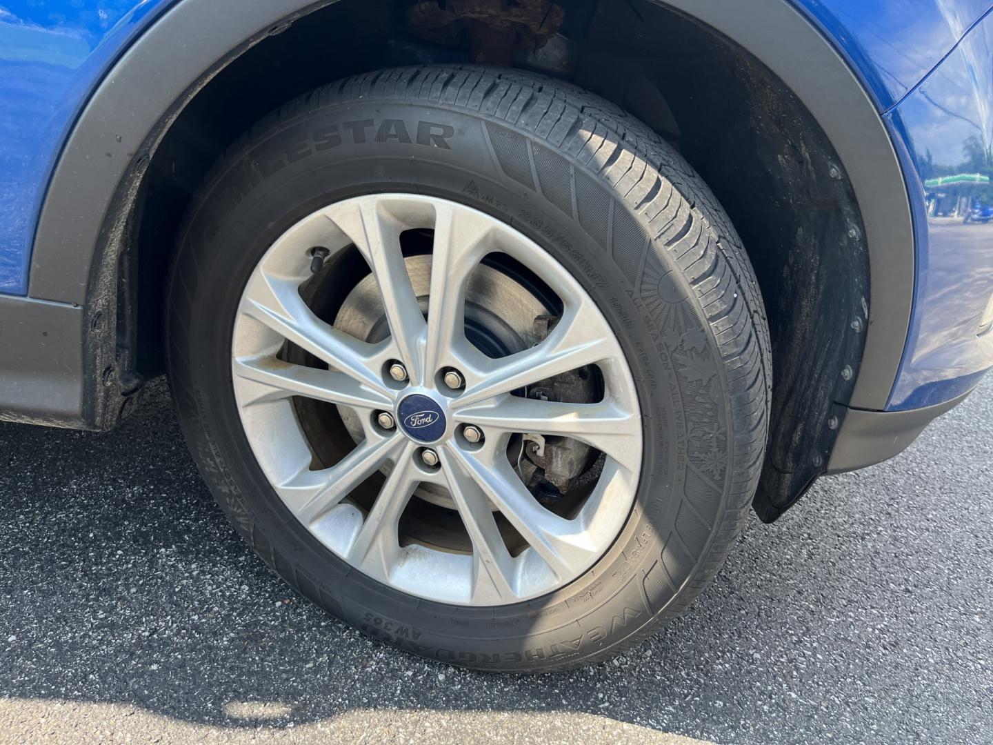 2018 Blue /Black Ford Escape SE 4WD (1FMCU9GD0JU) with an 1.5L I4 DOHC 16V Turbo engine, Automatic transmission, located at 547 E. Main St., Orwell, OH, 44076, (440) 437-5893, 41.535435, -80.847855 - 2018 Ford Escape SE 4WD – Efficient Compact SUV with Everyday Comfort and One-Owner History If you want a compact SUV that is easy to live with and ready for changing weather, this 2018 Ford Escape SE 4WD is a practical choice. The 1.5L Turbocharged EcoBoost engine and 6-speed automatic deliver r- Photo#5