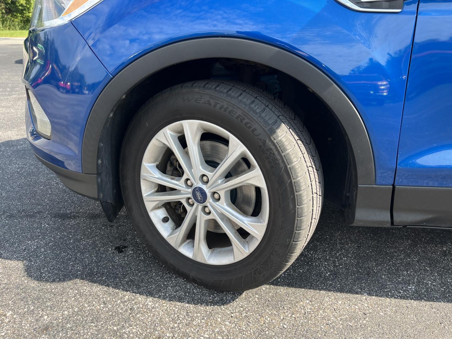 2018 Blue /Black Ford Escape SE 4WD (1FMCU9GD0JU) with an 1.5L I4 DOHC 16V Turbo engine, Automatic transmission, located at 547 E. Main St., Orwell, OH, 44076, (440) 437-5893, 41.535435, -80.847855 - 2018 Ford Escape SE 4WD – Efficient Compact SUV with Everyday Comfort and One-Owner History If you want a compact SUV that is easy to live with and ready for changing weather, this 2018 Ford Escape SE 4WD is a practical choice. The 1.5L Turbocharged EcoBoost engine and 6-speed automatic deliver r- Photo#13