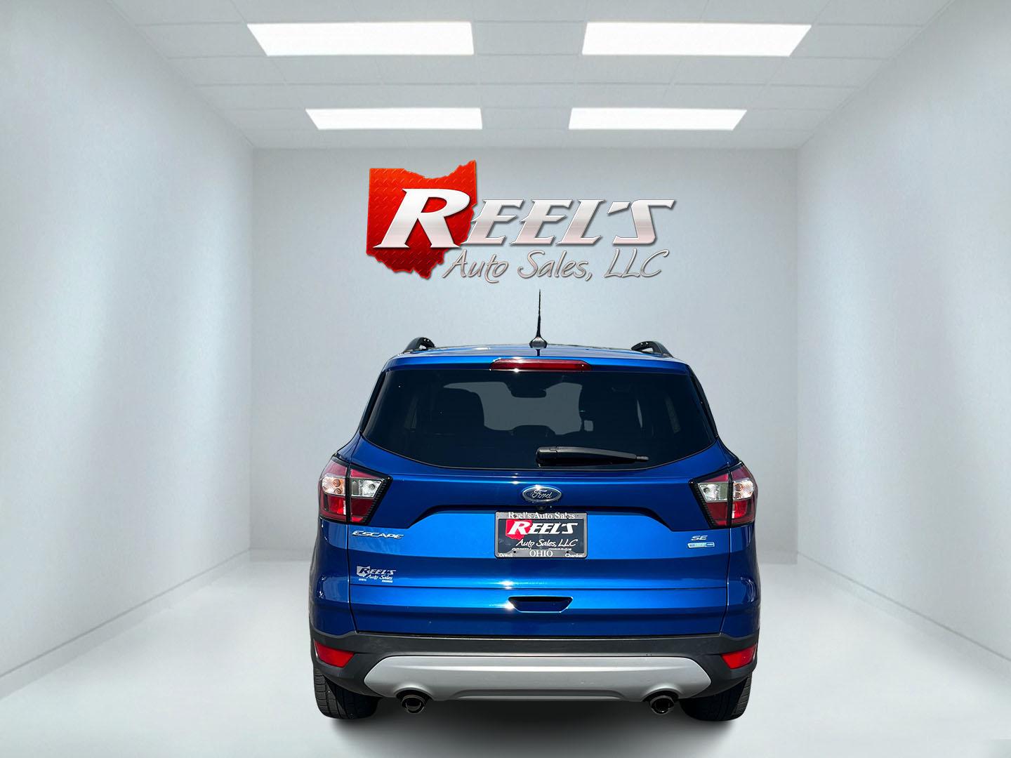 2018 Blue /Black Ford Escape SE 4WD (1FMCU9GD0JU) with an 1.5L I4 DOHC 16V Turbo engine, Automatic transmission, located at 547 E. Main St., Orwell, OH, 44076, (440) 437-5893, 41.535435, -80.847855 - 2018 Ford Escape SE 4WD – Efficient Compact SUV with Everyday Comfort and One-Owner History If you want a compact SUV that is easy to live with and ready for changing weather, this 2018 Ford Escape SE 4WD is a practical choice. The 1.5L Turbocharged EcoBoost engine and 6-speed automatic deliver r- Photo#9