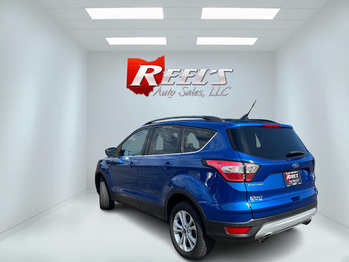2018 Blue /Black Ford Escape SE 4WD (1FMCU9GD0JU) with an 1.5L I4 DOHC 16V Turbo engine, Automatic transmission, located at 547 E. Main St., Orwell, OH, 44076, (440) 437-5893, 41.535435, -80.847855 - 2018 Ford Escape SE 4WD – Efficient Compact SUV with Everyday Comfort and One-Owner History If you want a compact SUV that is easy to live with and ready for changing weather, this 2018 Ford Escape SE 4WD is a practical choice. The 1.5L Turbocharged EcoBoost engine and 6-speed automatic deliver r- Photo#10