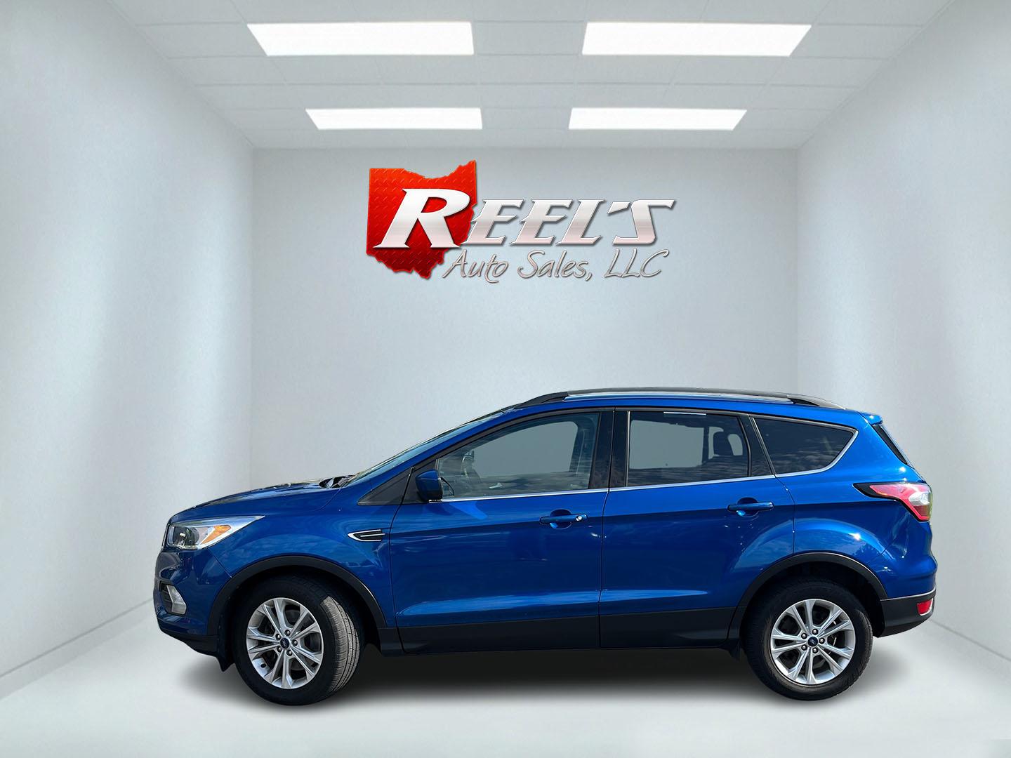 2018 Blue /Black Ford Escape SE 4WD (1FMCU9GD0JU) with an 1.5L I4 DOHC 16V Turbo engine, Automatic transmission, located at 547 E. Main St., Orwell, OH, 44076, (440) 437-5893, 41.535435, -80.847855 - 2018 Ford Escape SE 4WD – Efficient Compact SUV with Everyday Comfort and One-Owner History If you want a compact SUV that is easy to live with and ready for changing weather, this 2018 Ford Escape SE 4WD is a practical choice. The 1.5L Turbocharged EcoBoost engine and 6-speed automatic deliver r- Photo#12